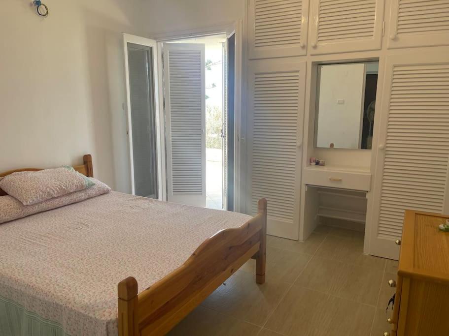 Three-Bedroom House - Photo 24