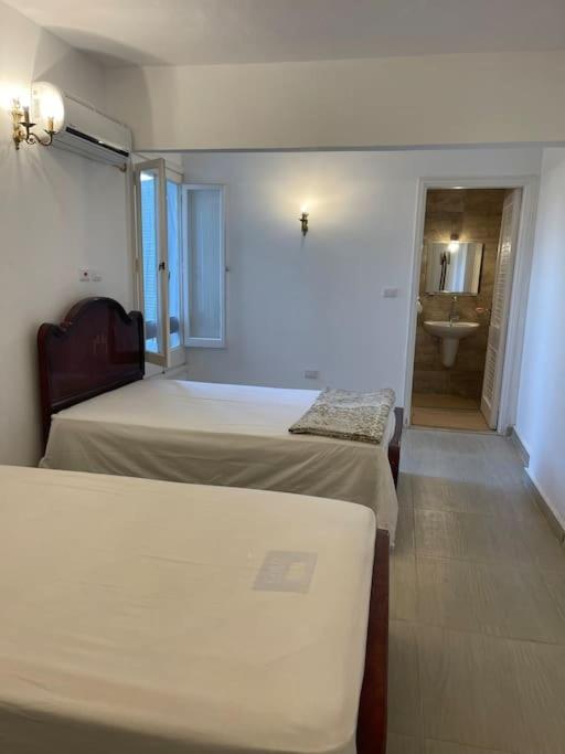 Three-Bedroom House - Photo 22