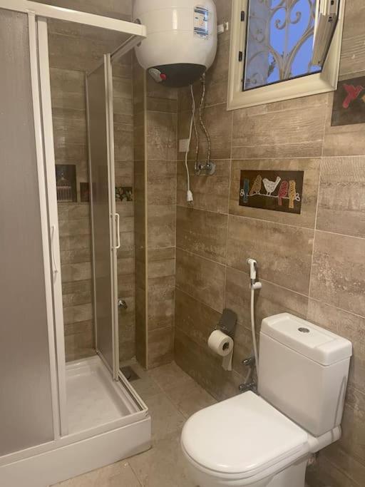 Three-Bedroom House - Photo 23