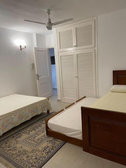Three-Bedroom House - Photo 18