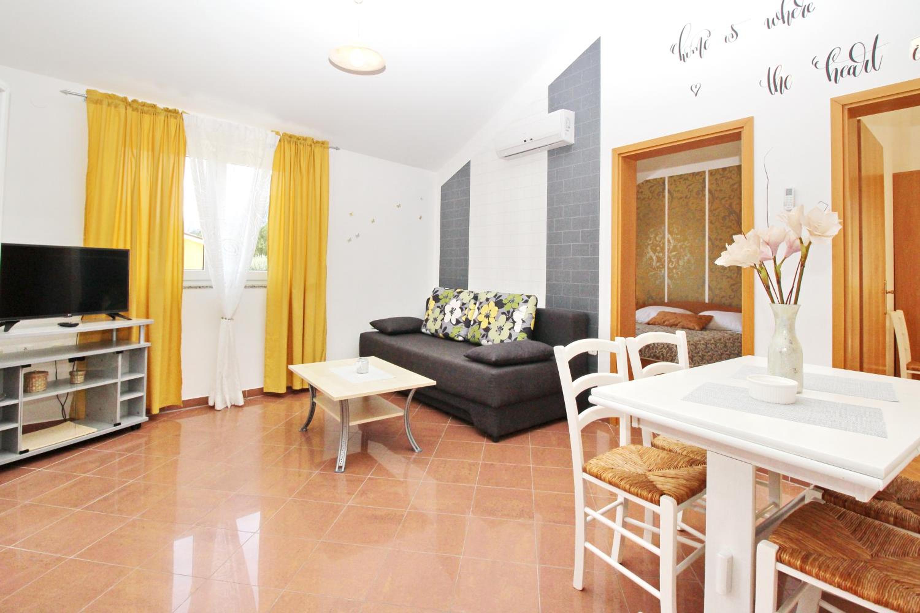 Two-Bedroom Apartment with Balcony and Sea View