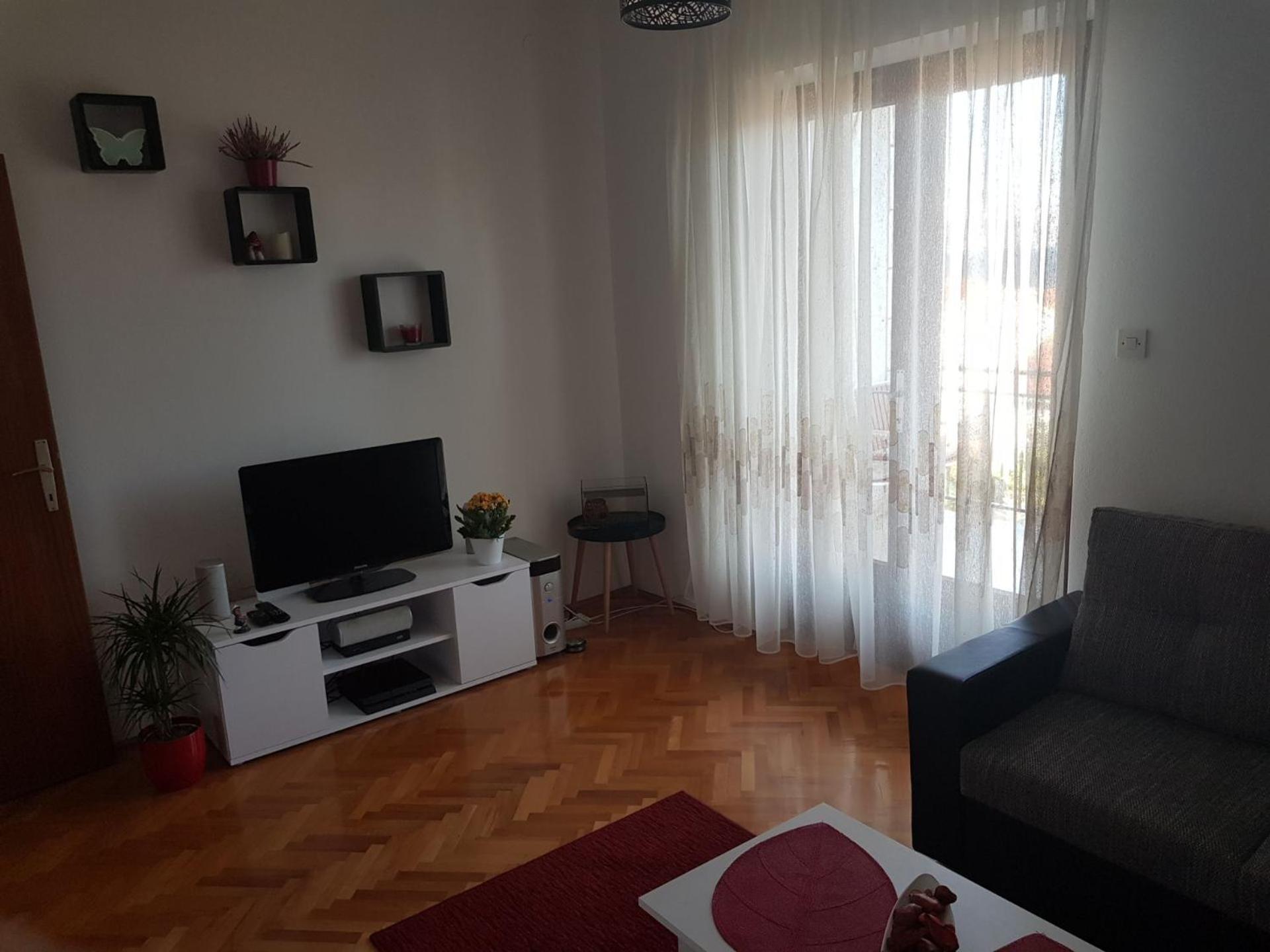 Two-Bedroom Apartment with Balcony and Sea View