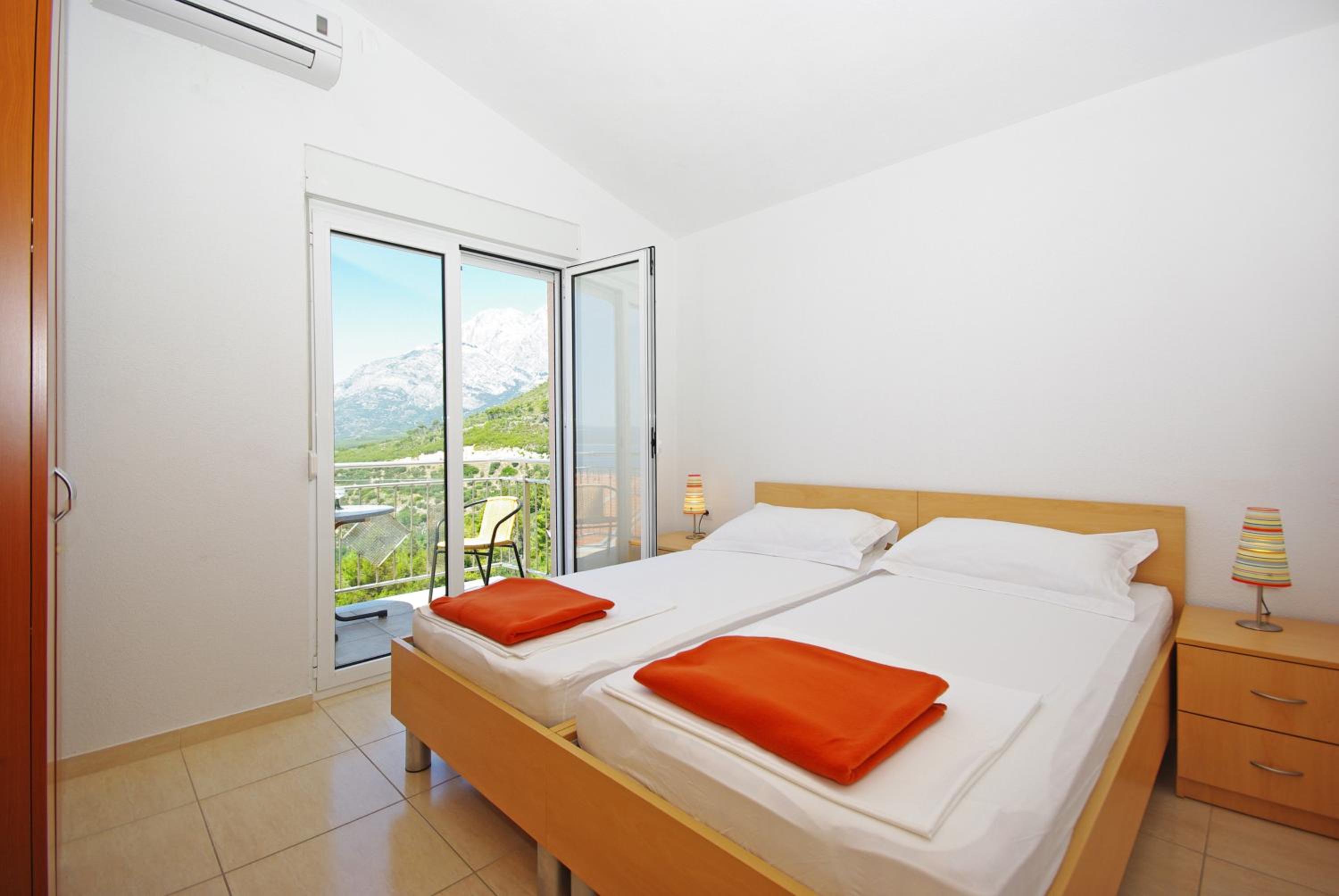 Two-Bedroom Apartment with Balcony and Sea View