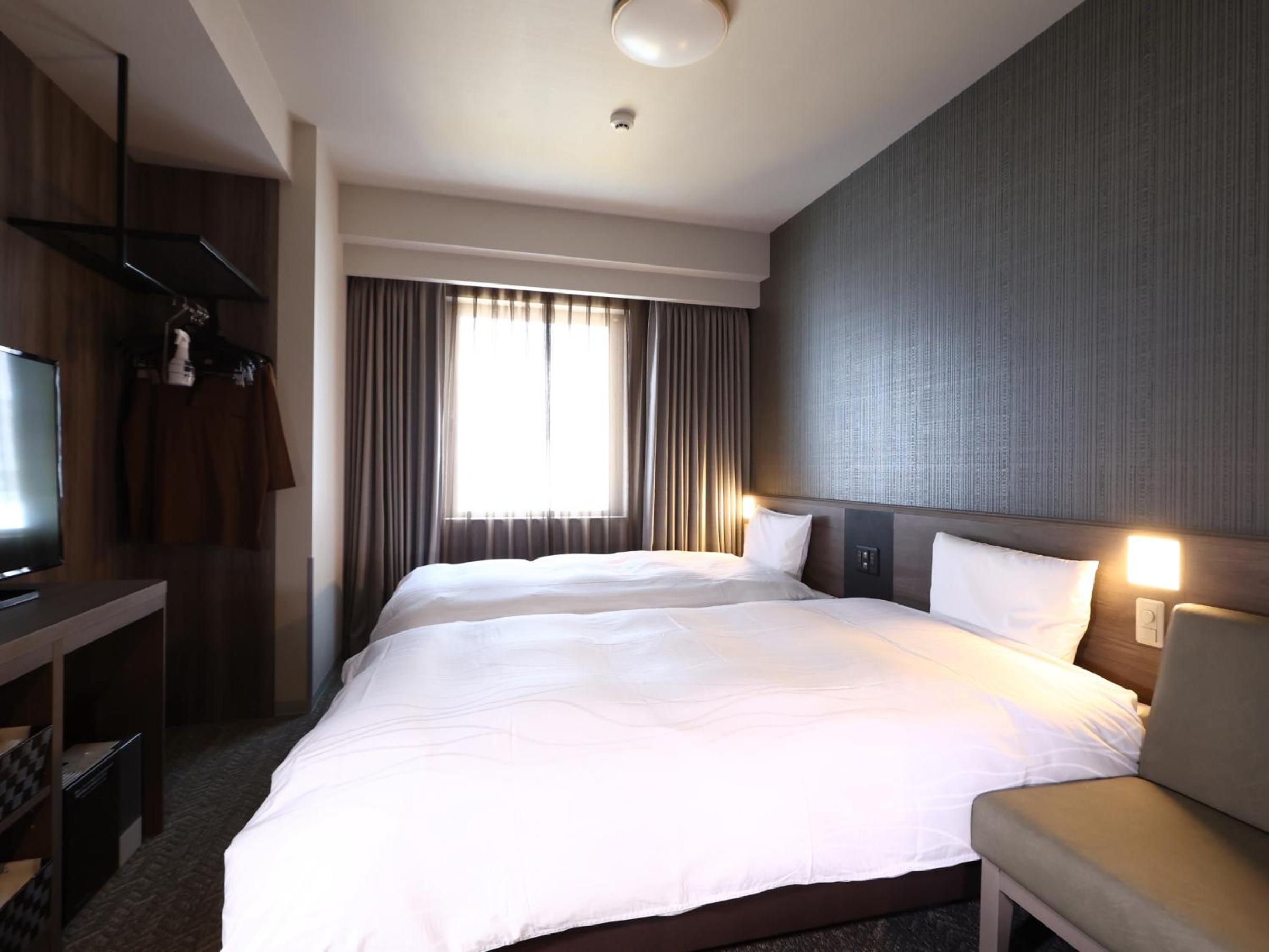 Standard Twin Room - No Daily Cleaning - Photo 1