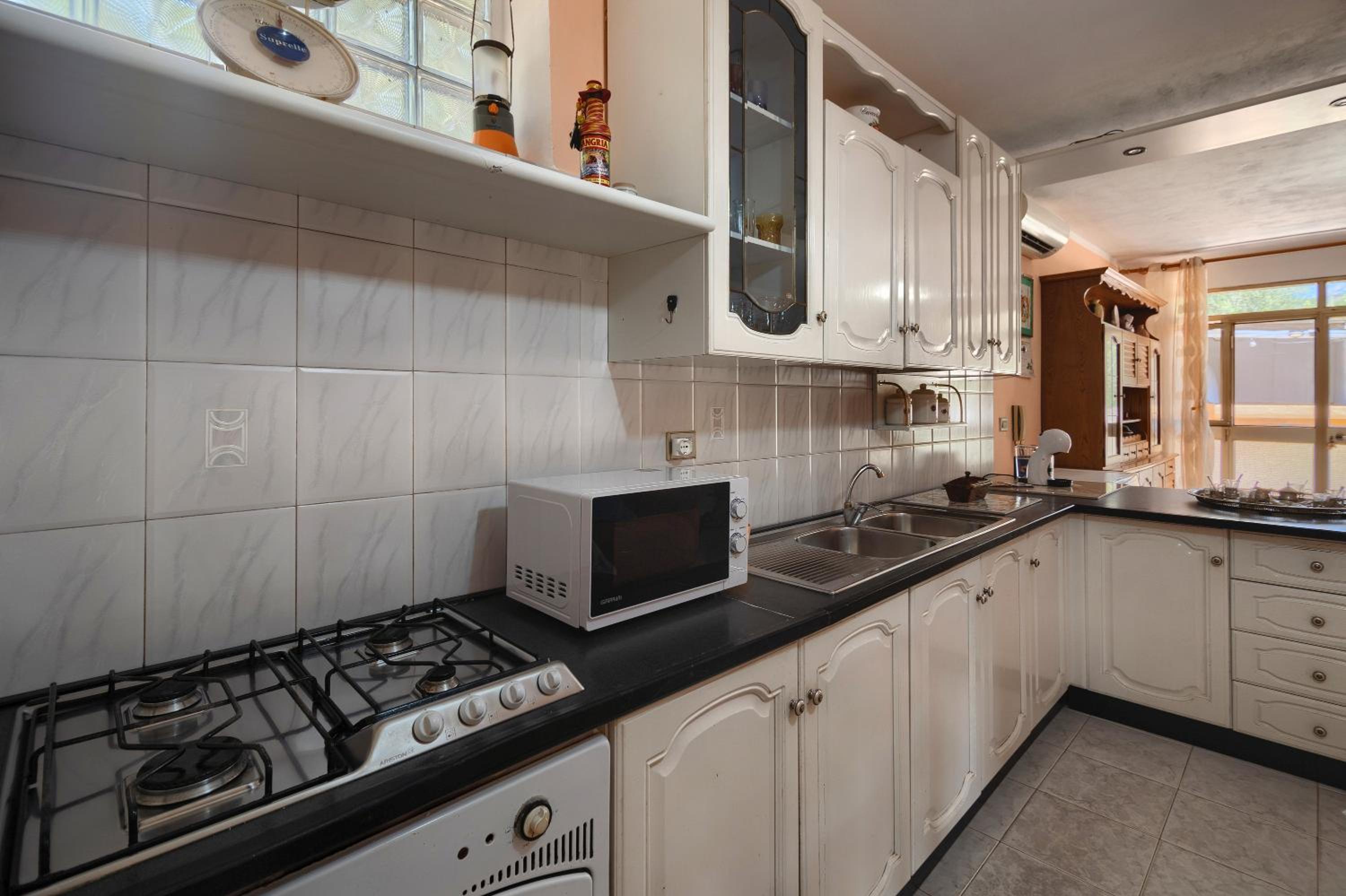 Three-Bedroom House photo 2