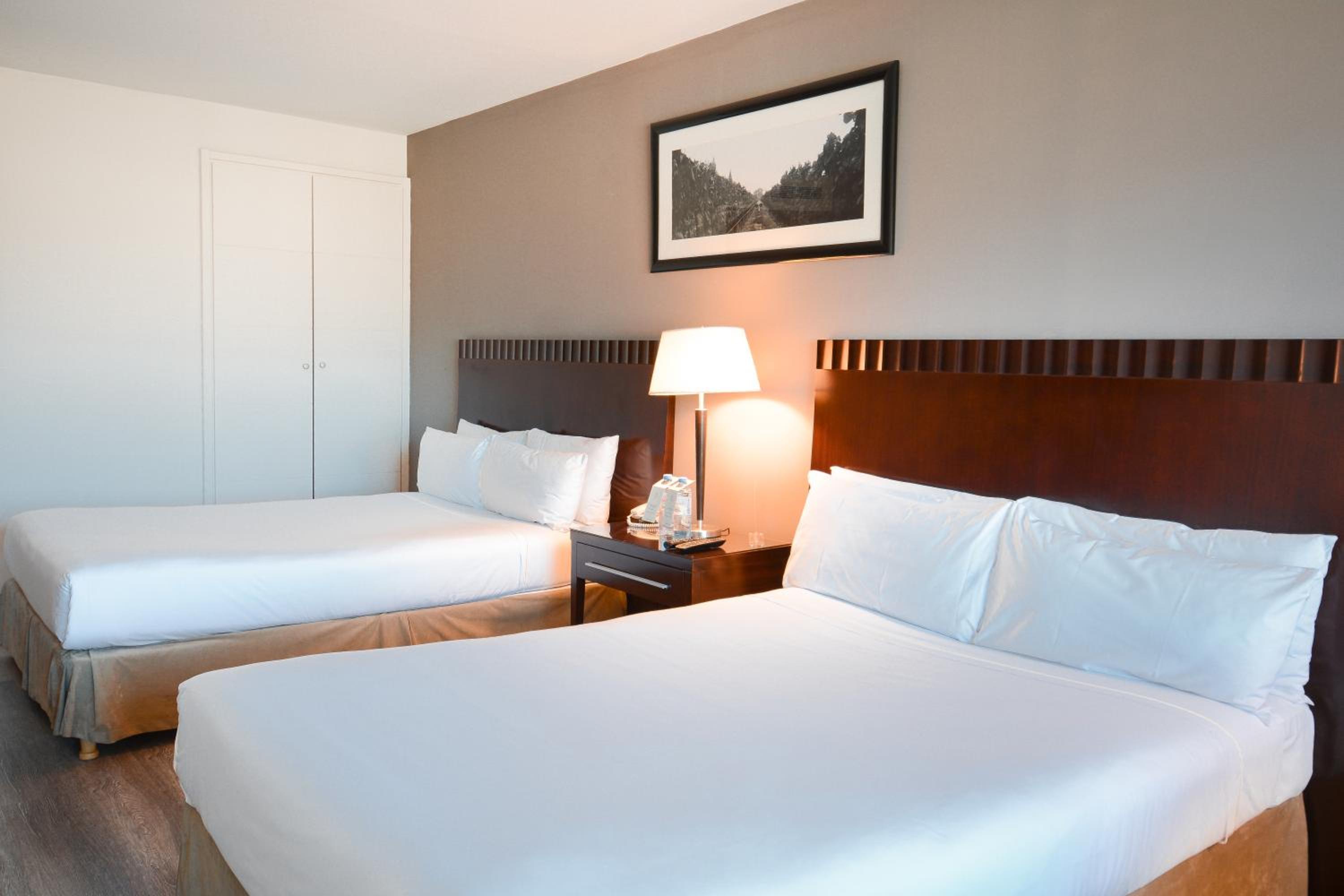 Standard Quadruple Room (2 Adults+ 2 Children)