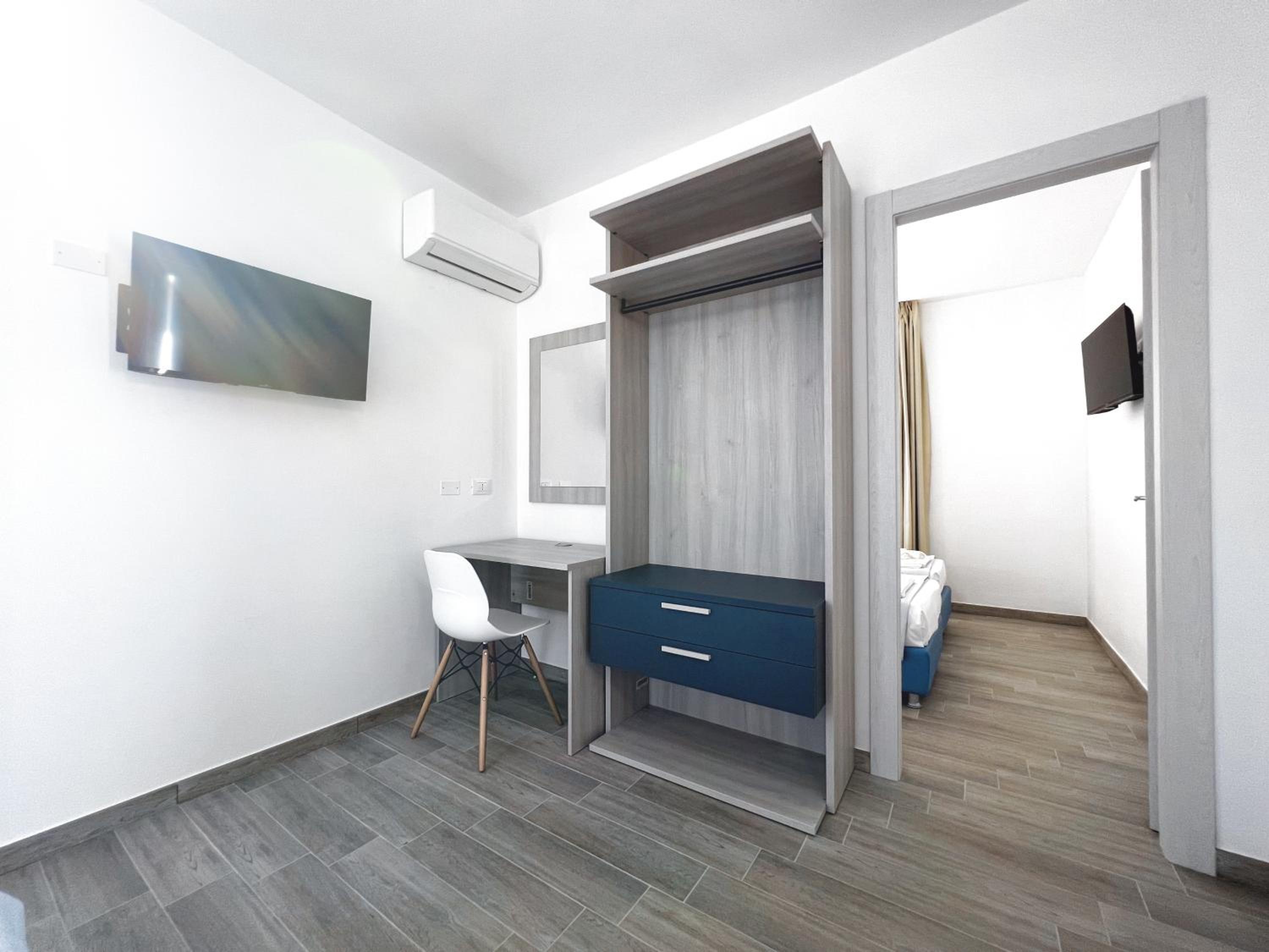 Quadruple Room with Balcony photo 2