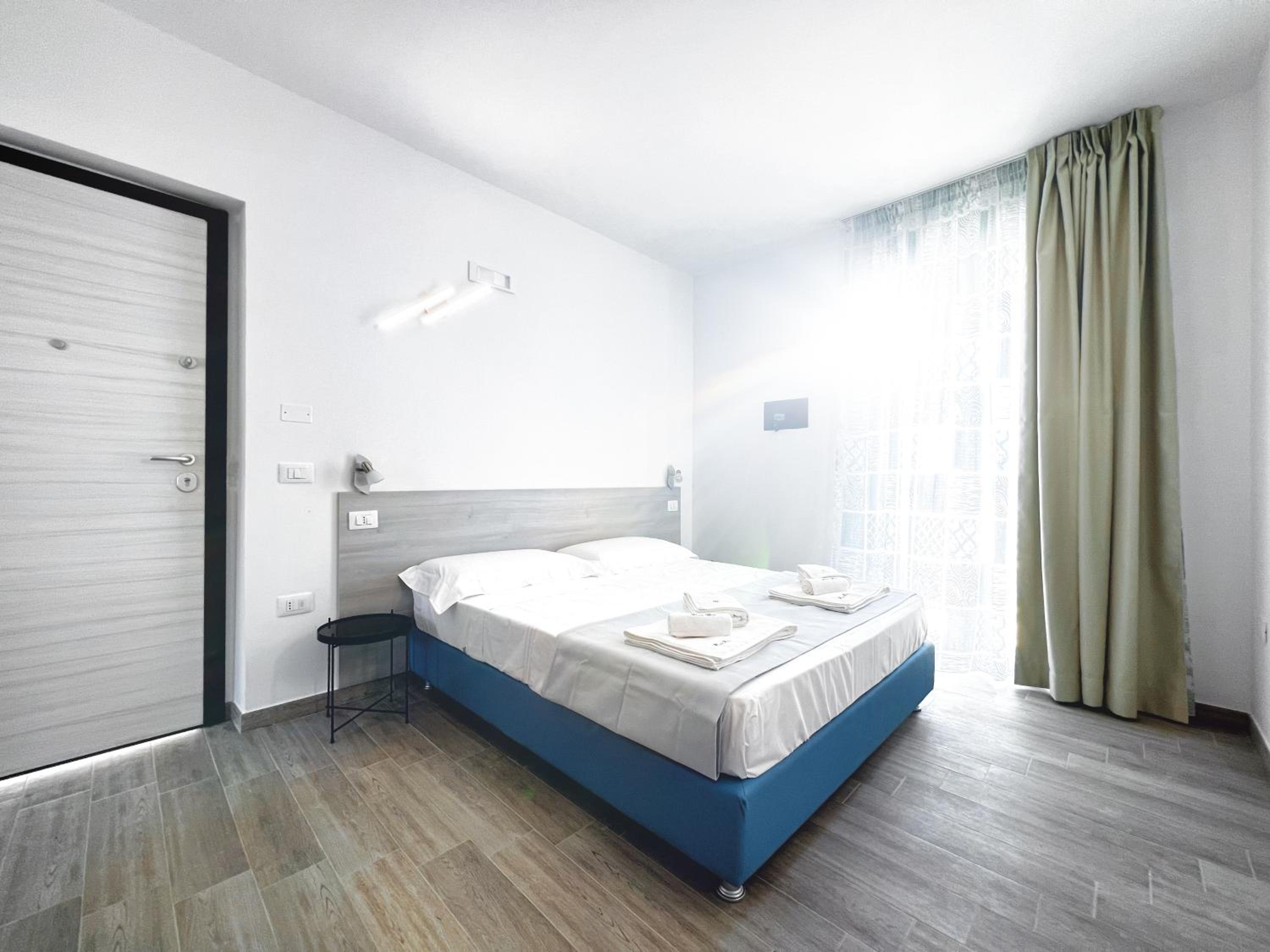 Quadruple Room with Balcony photo 1