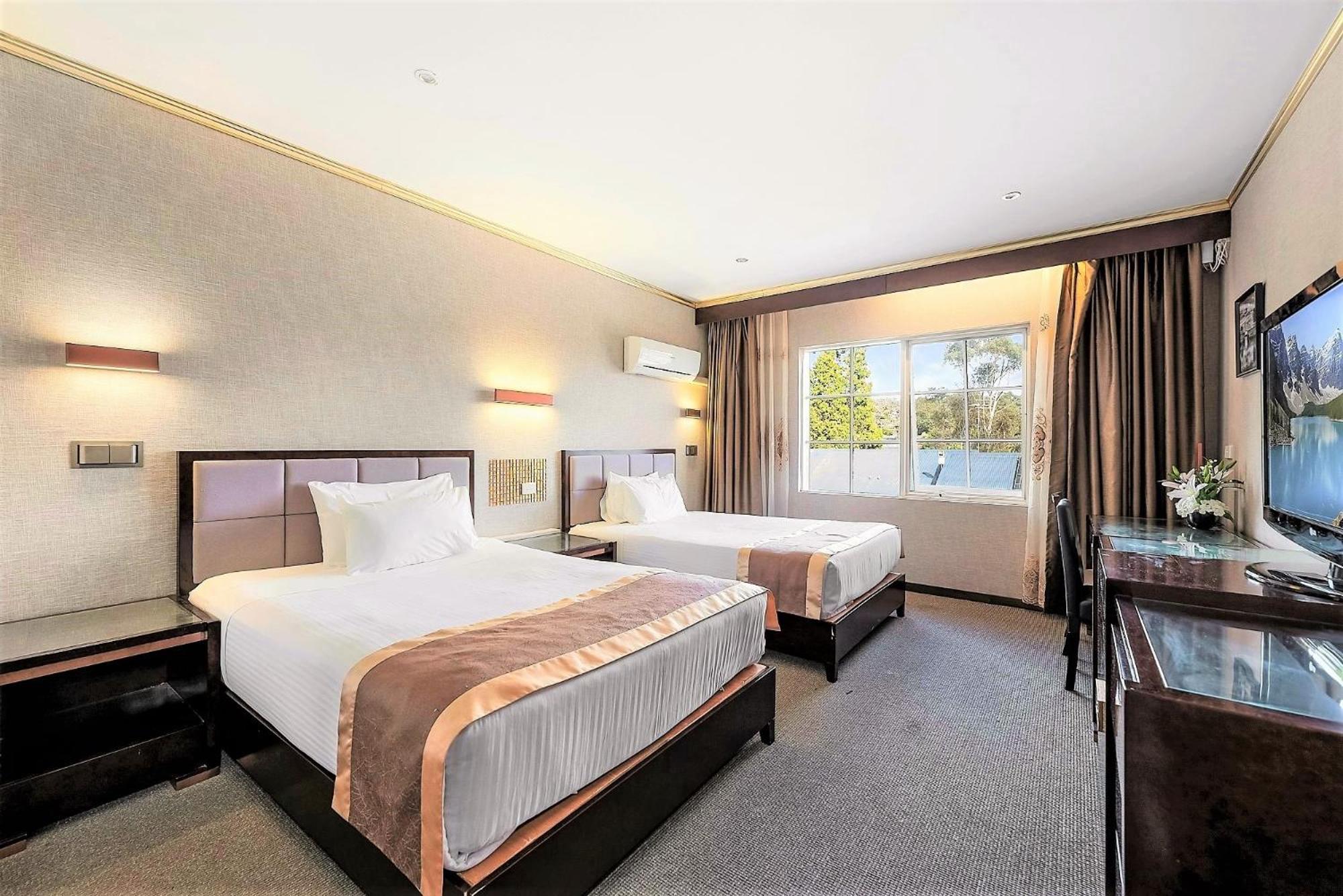 Deluxe Hotel Room with Two Double Beds