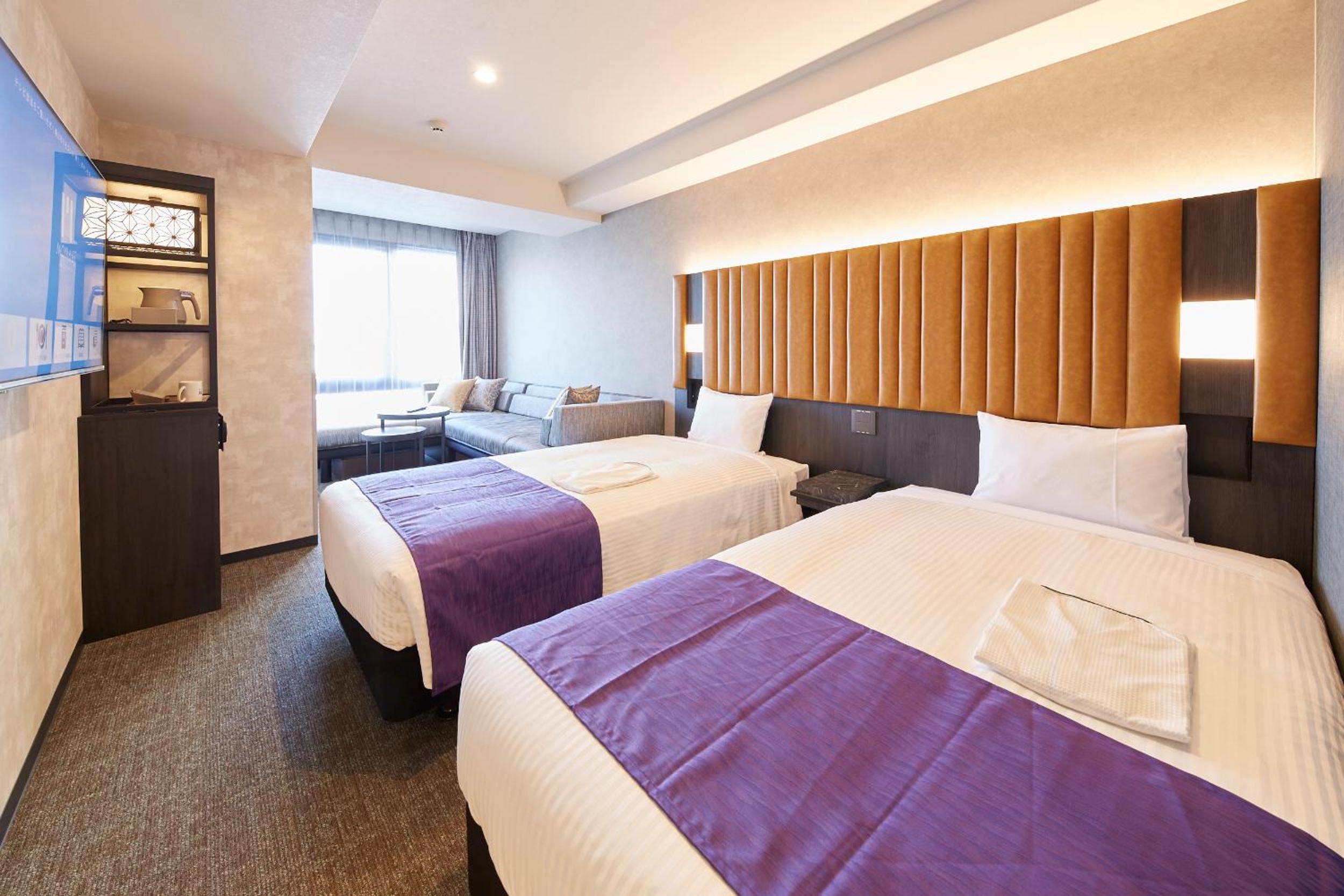 Deluxe Twin Room with Sofa bed and Extra bed - Photo 1