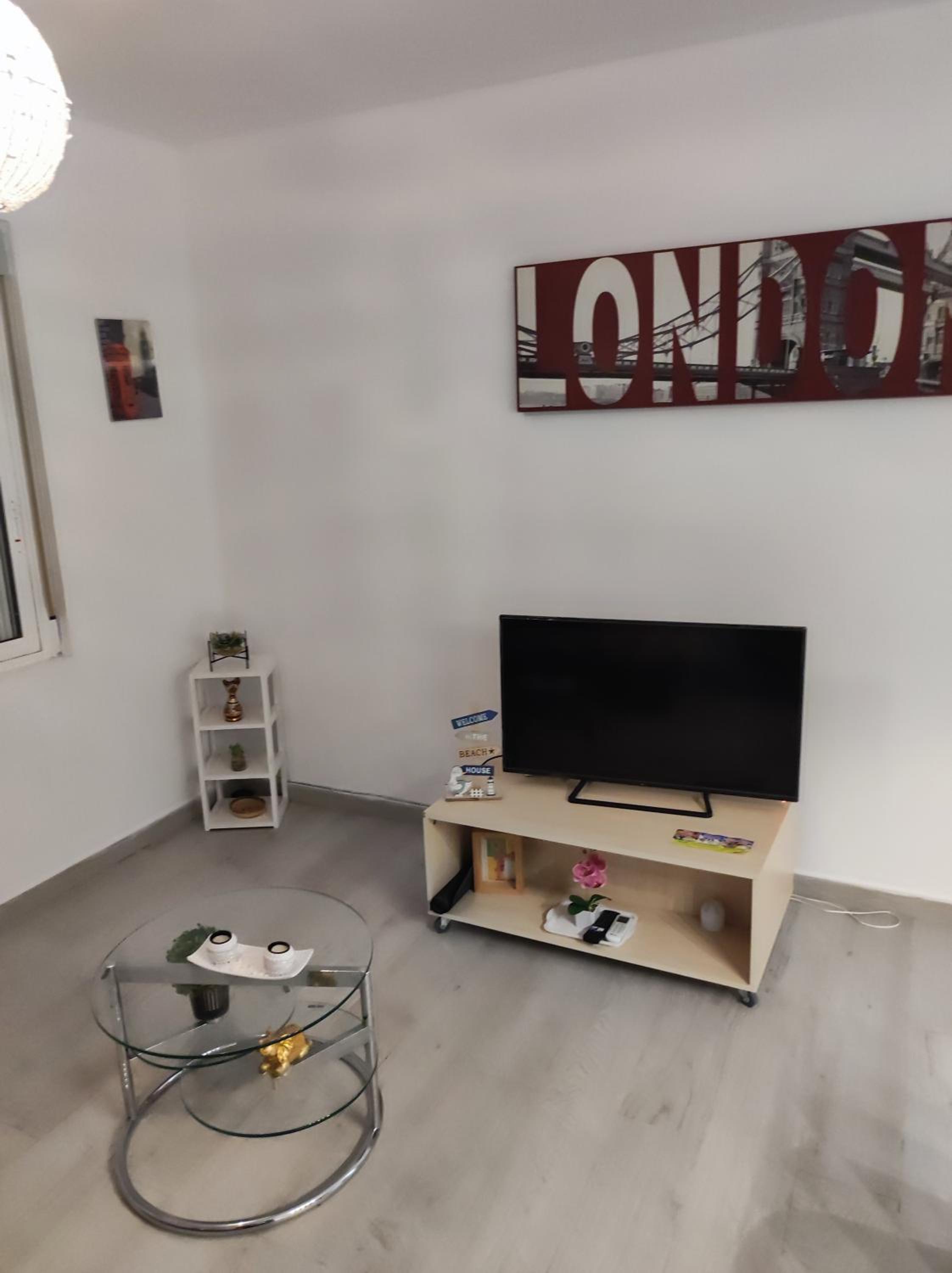 Three-Bedroom Apartment - Photo 25