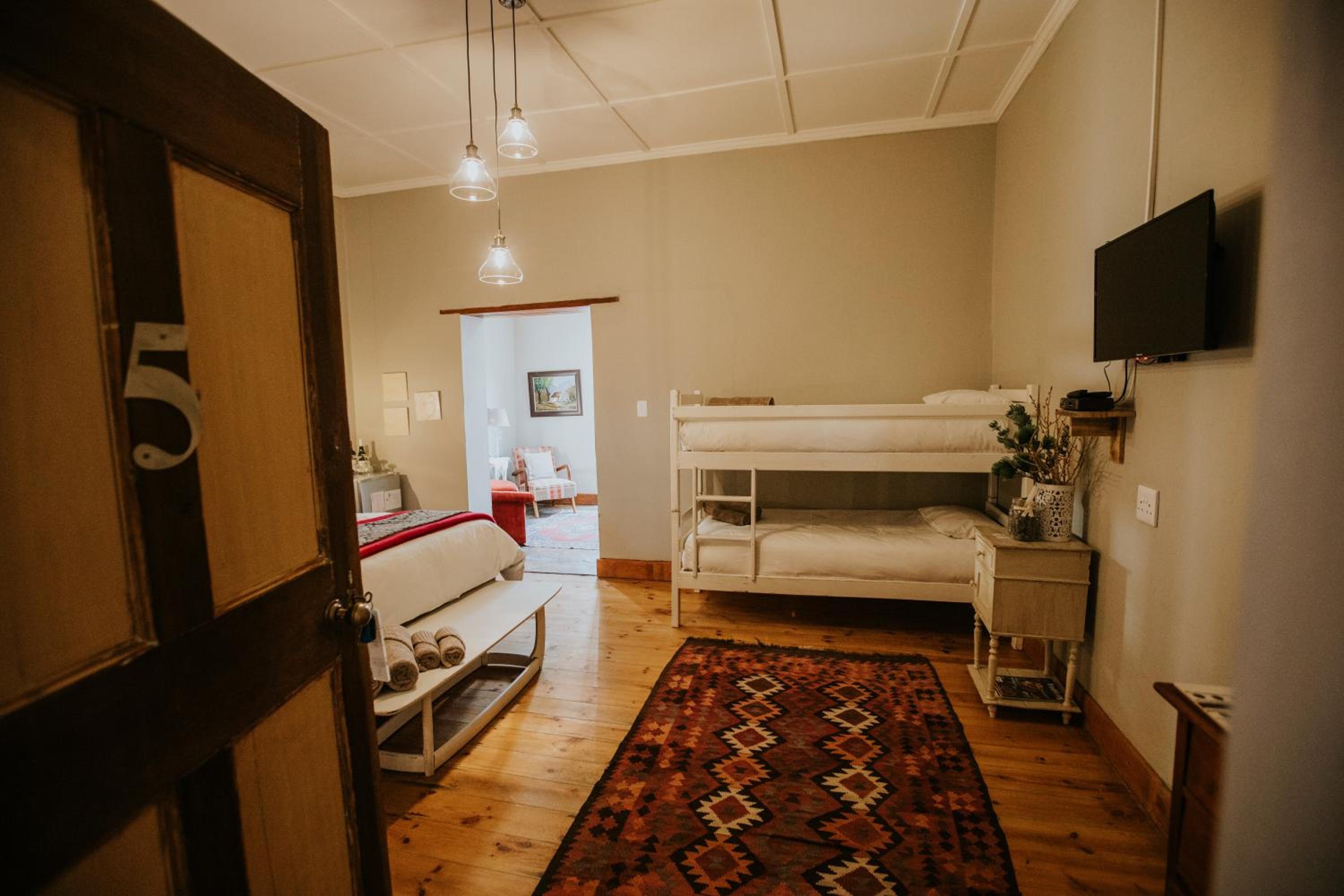 Deluxe Triple Room - Photo 9