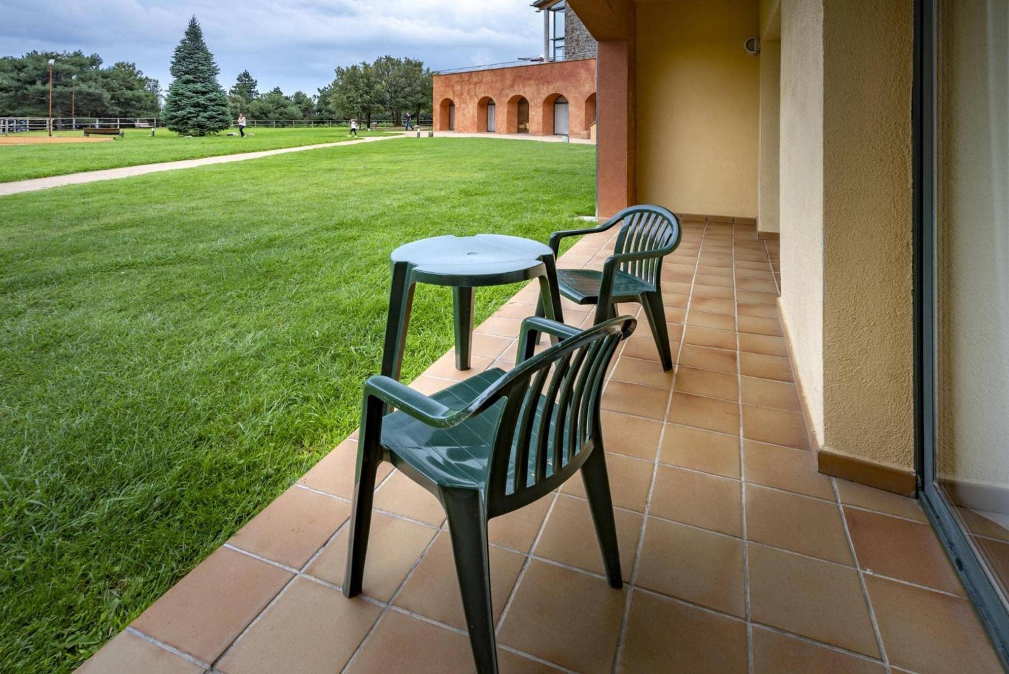 Habitación triple con vista al jardín (2 adultos + 1 niño) Habitación triple con vista al jardín (2 adultos + 1 niño)