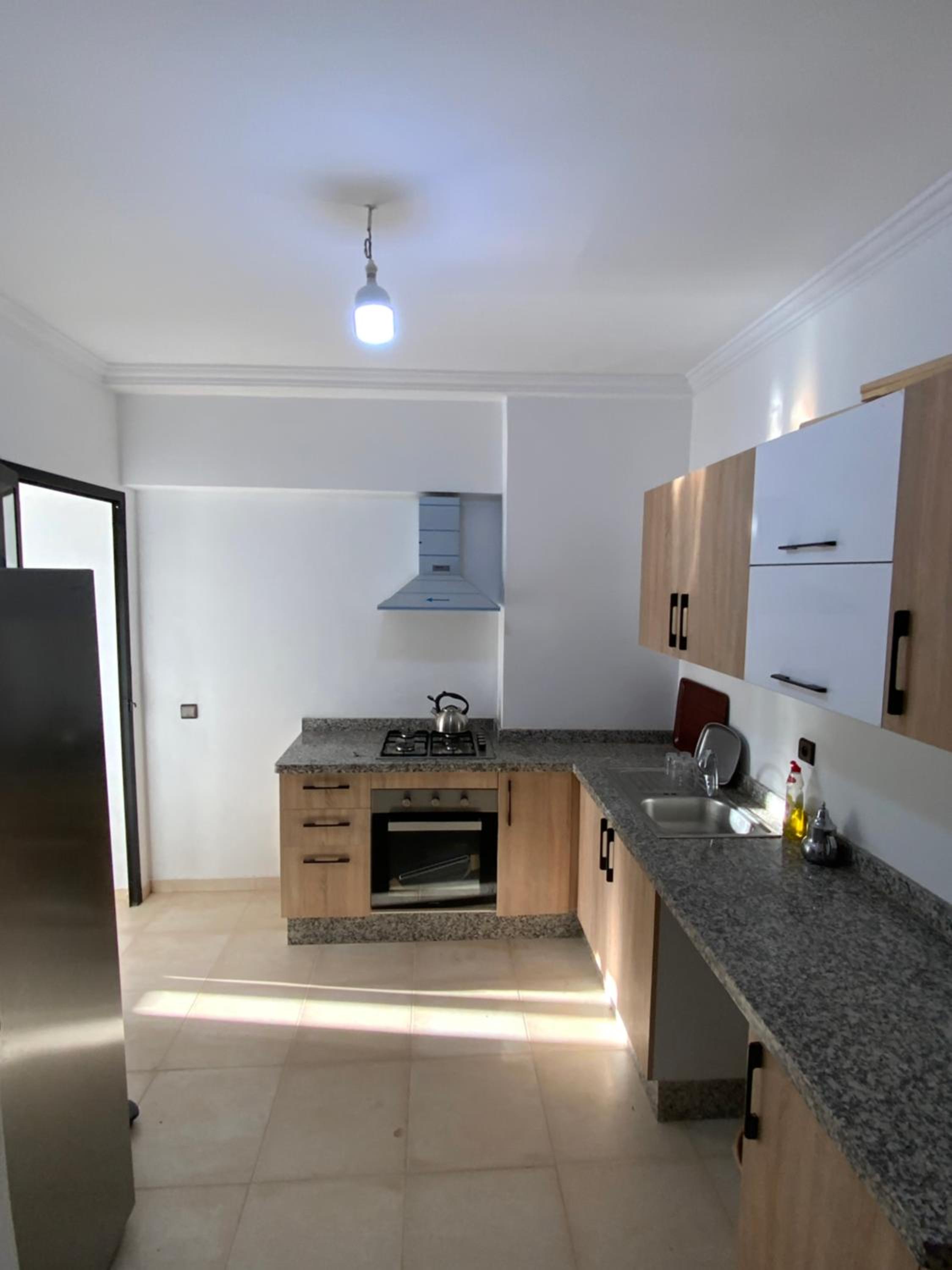 Three-Bedroom Apartment - Photo 14