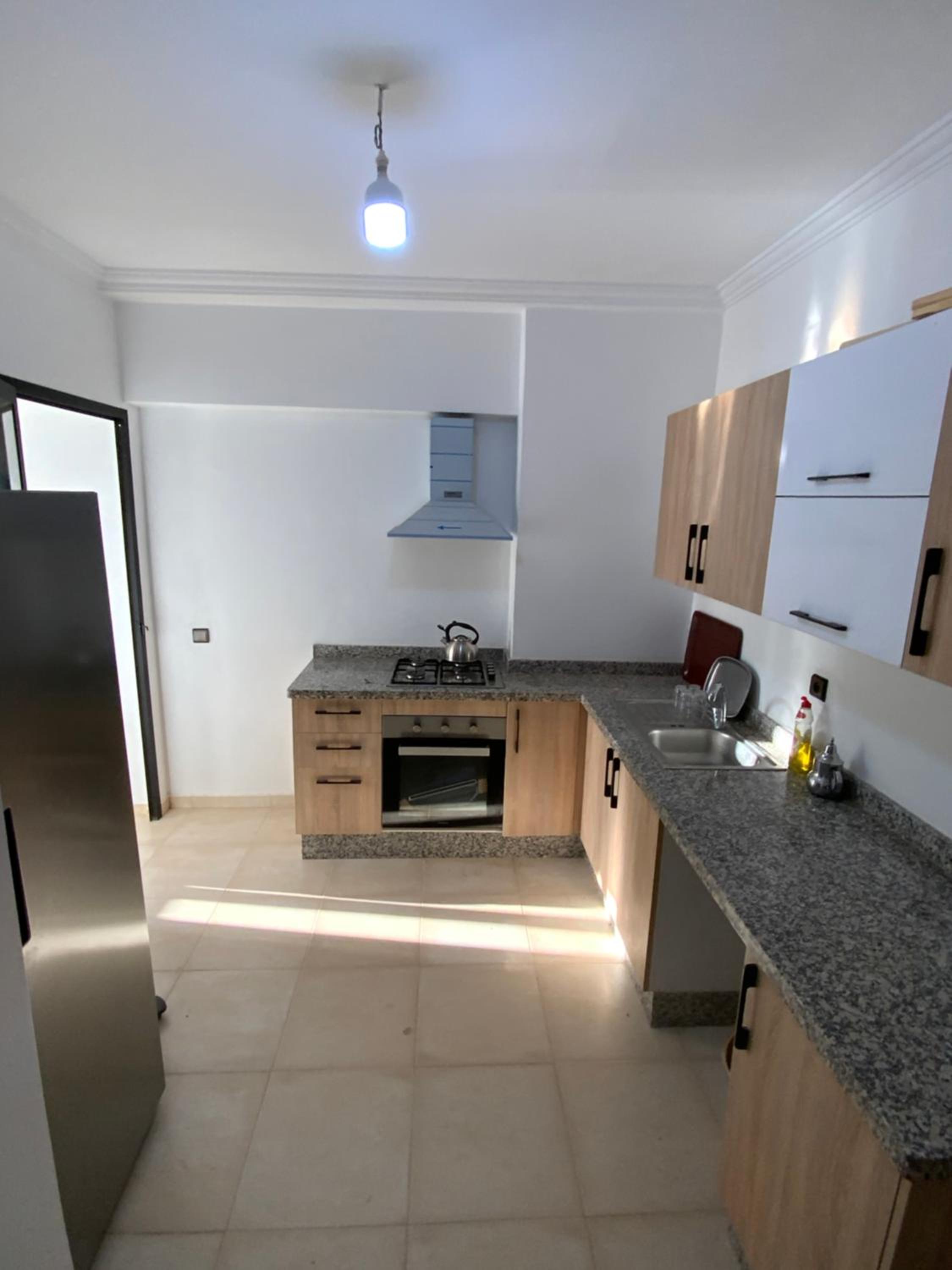 Three-Bedroom Apartment - Photo 2