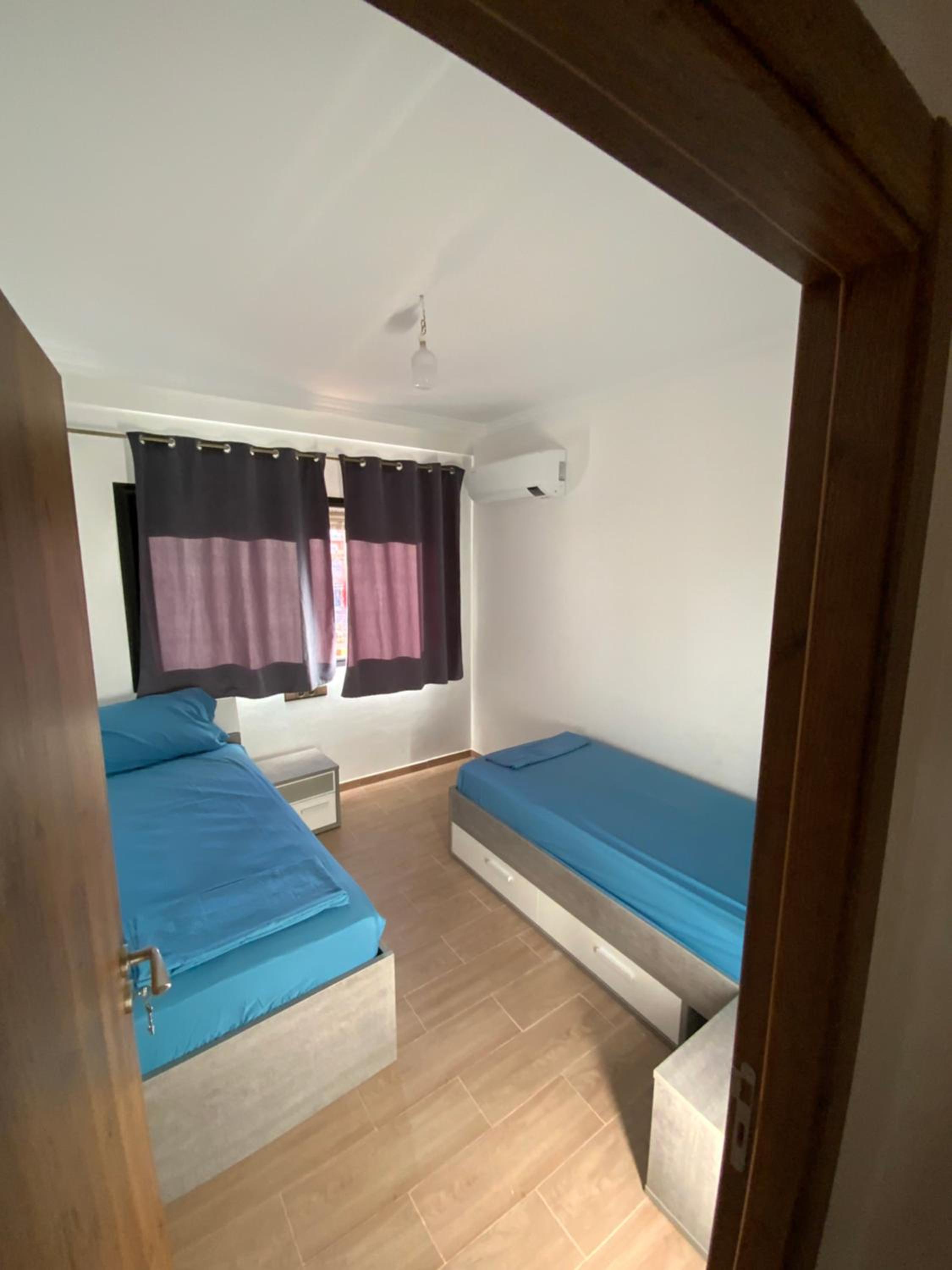 Three-Bedroom Apartment - Photo 7