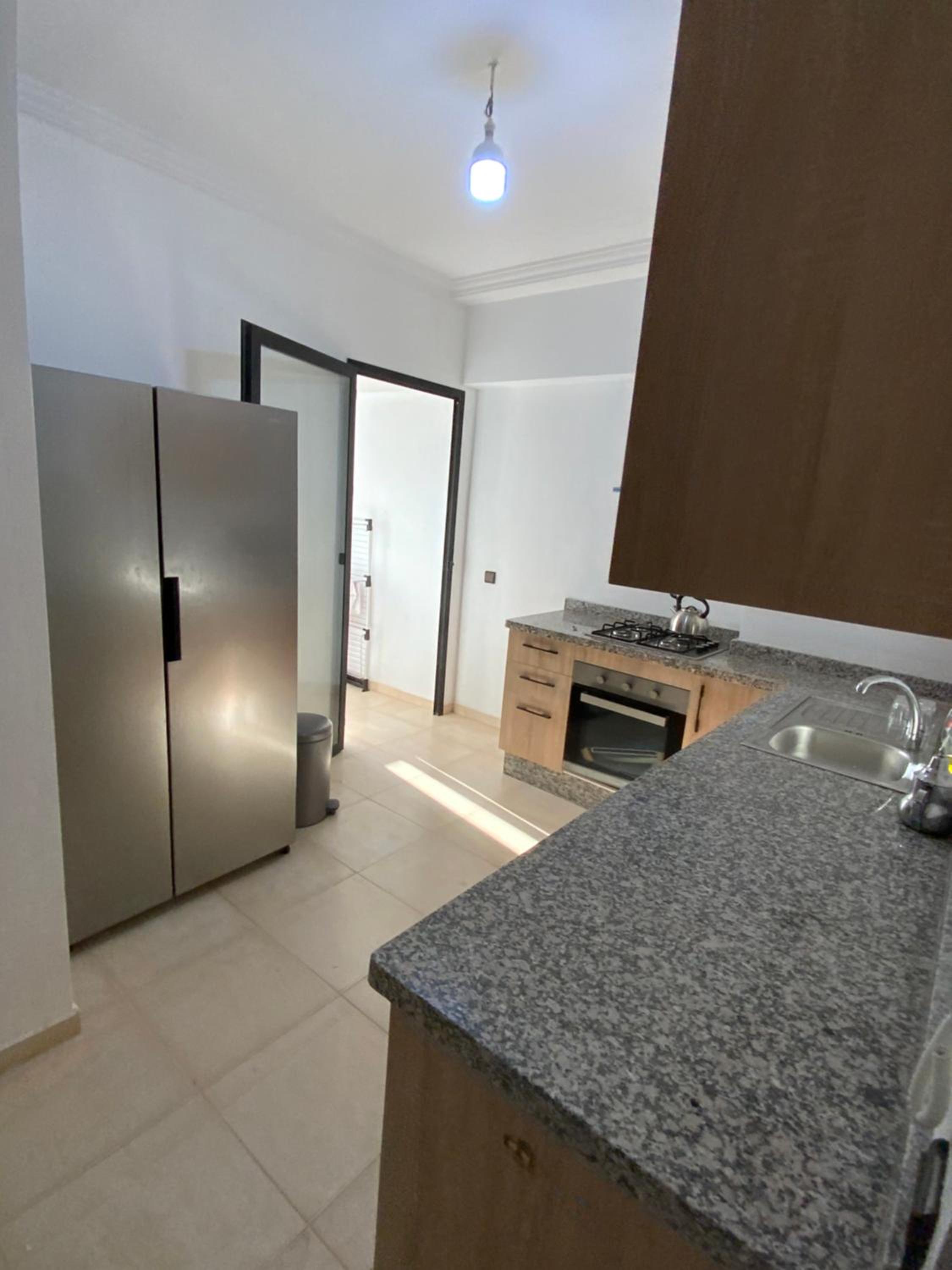 Three-Bedroom Apartment - Photo 4