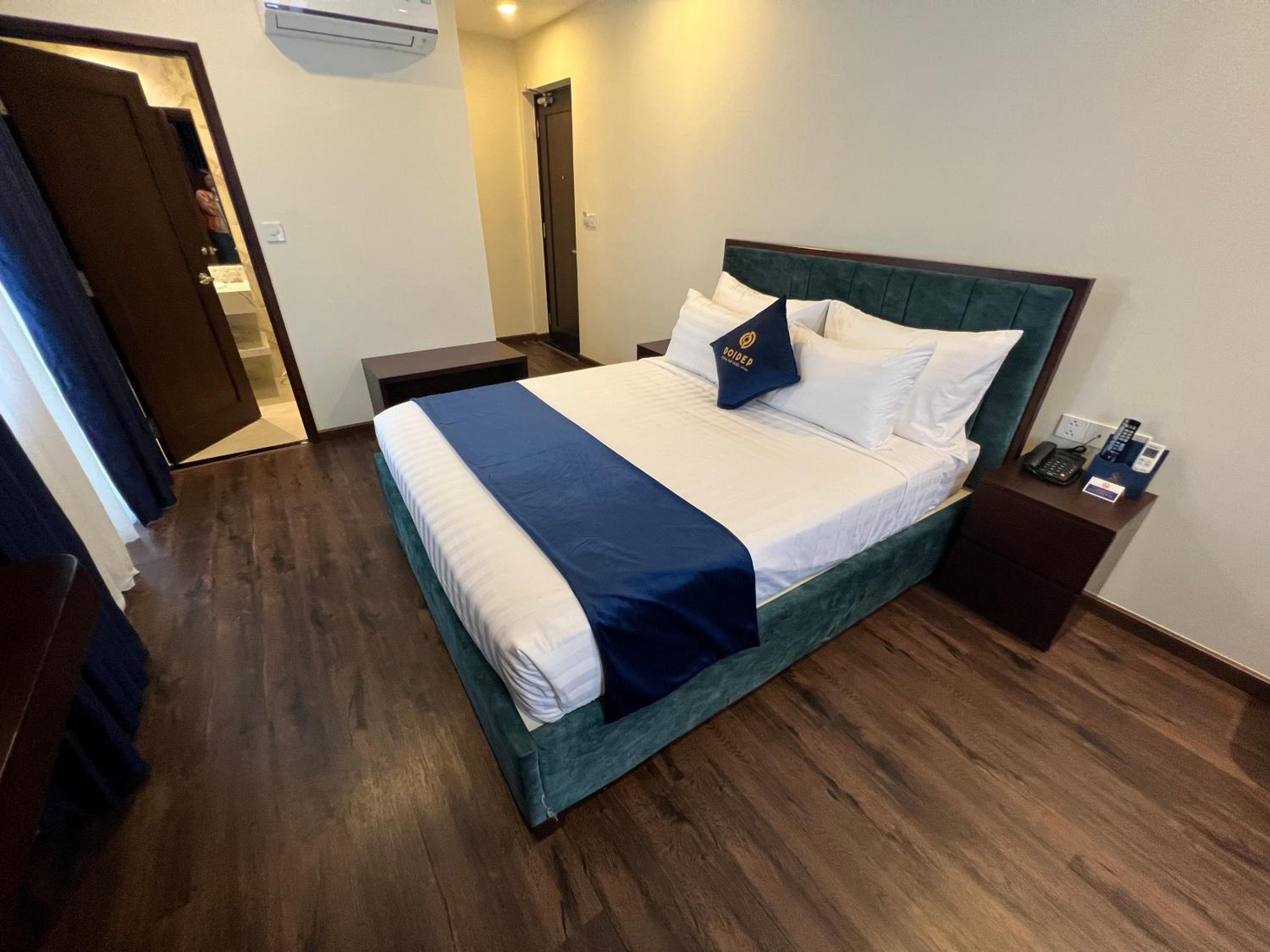 Deluxe Room - Photo 1