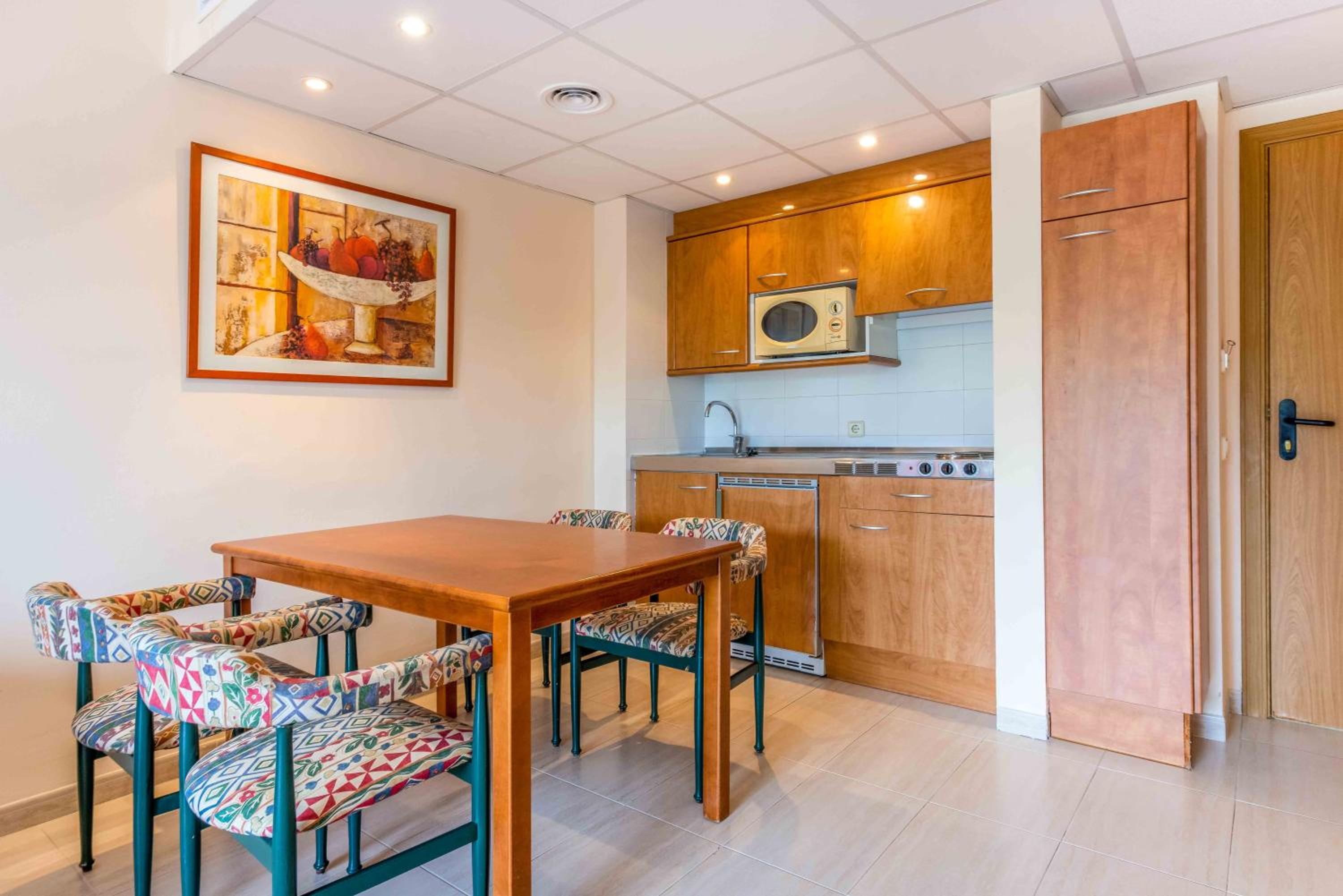 One-Bedroom Apartment with Balcony and Garden View