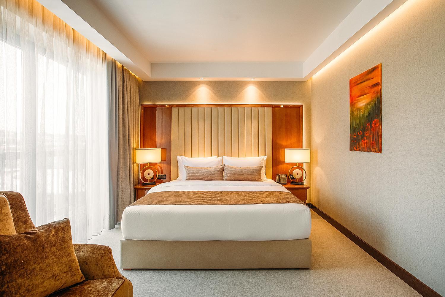 King Suite with Balcony - Photo 1