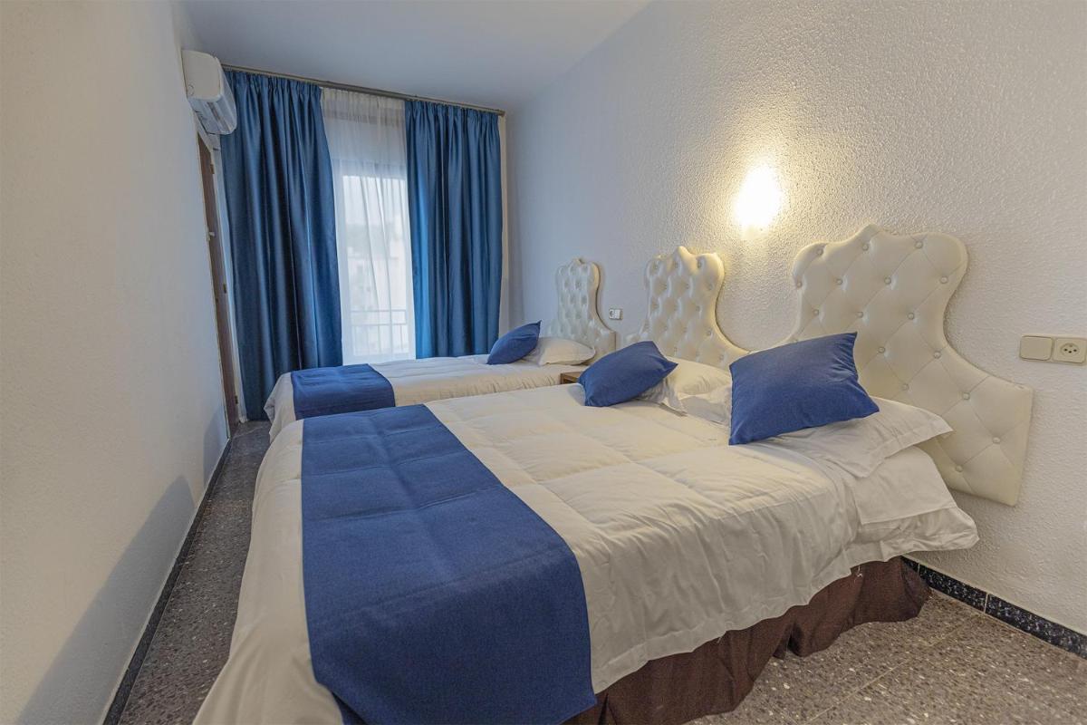 Quadruple Room with Balcony photo 1