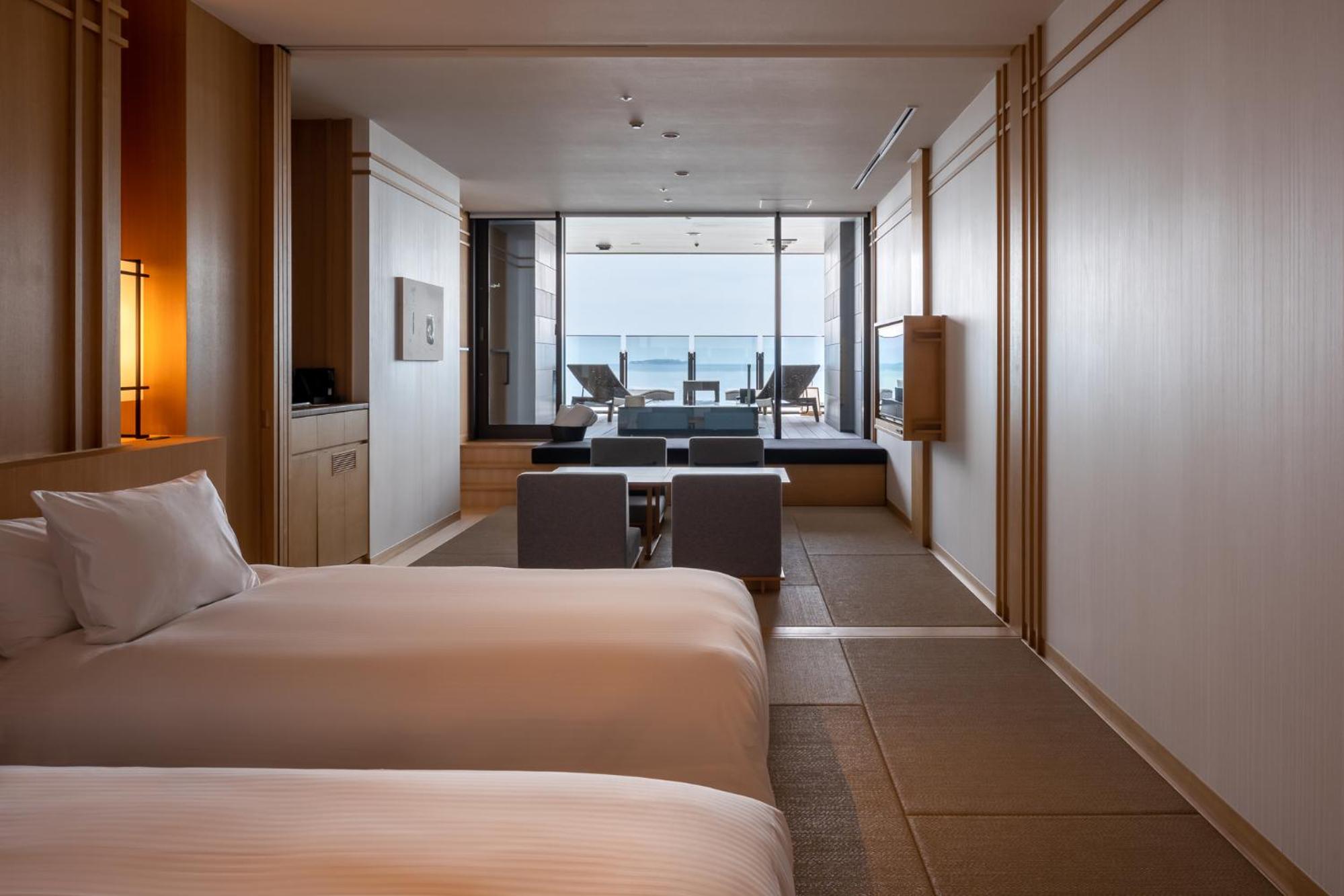 Deluxe Twin Room with Tatami Area and Open-Air Bath - Ocean View - Photo 1