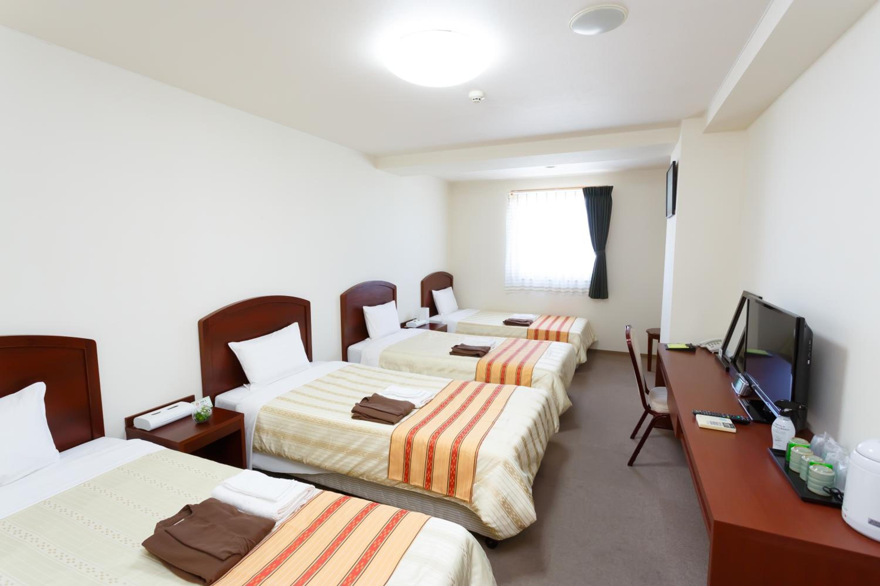 Standard Quadruple Room - Smoking photo 1