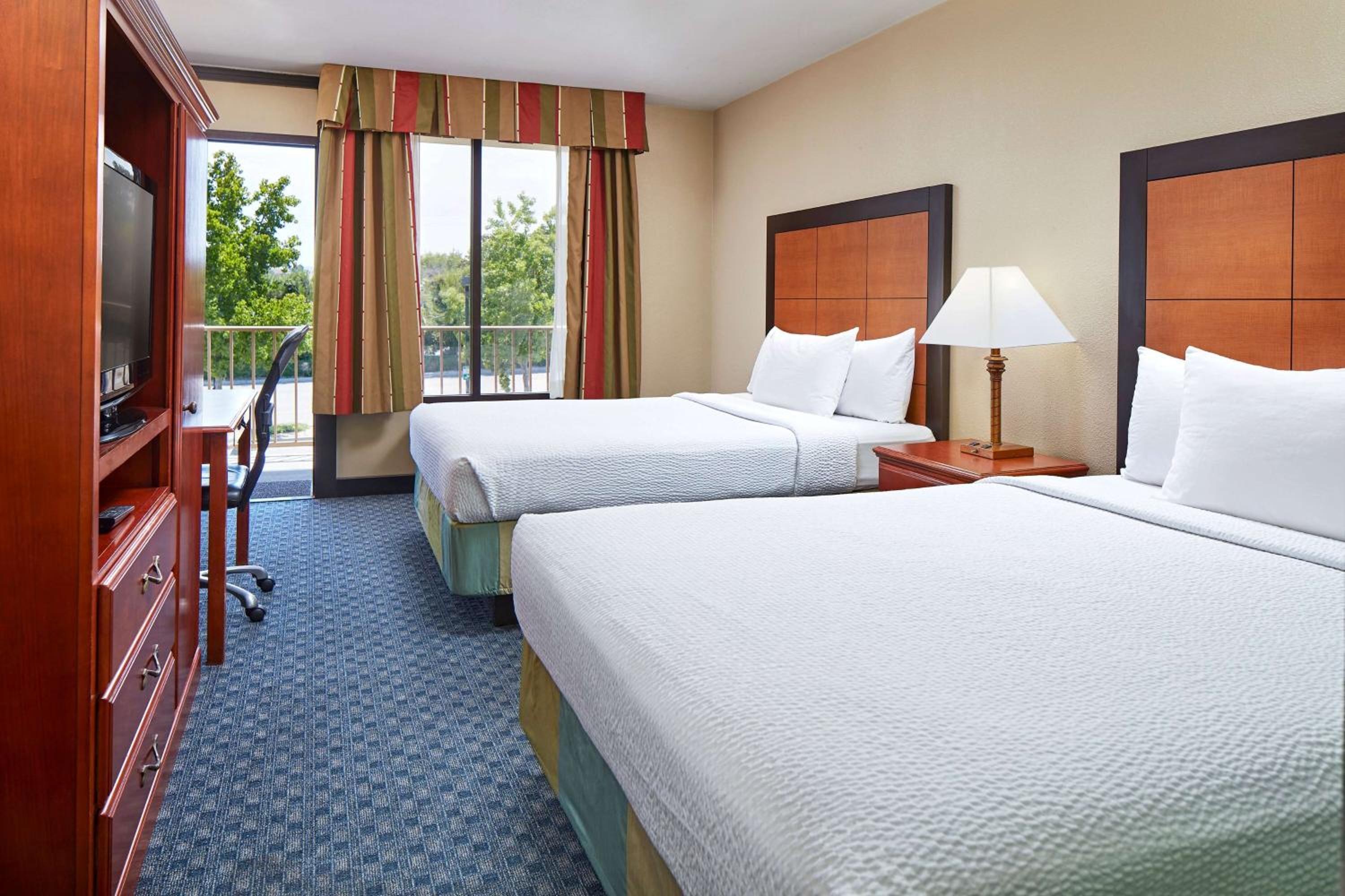 Queen Room with Two Queen Beds - Photo 1