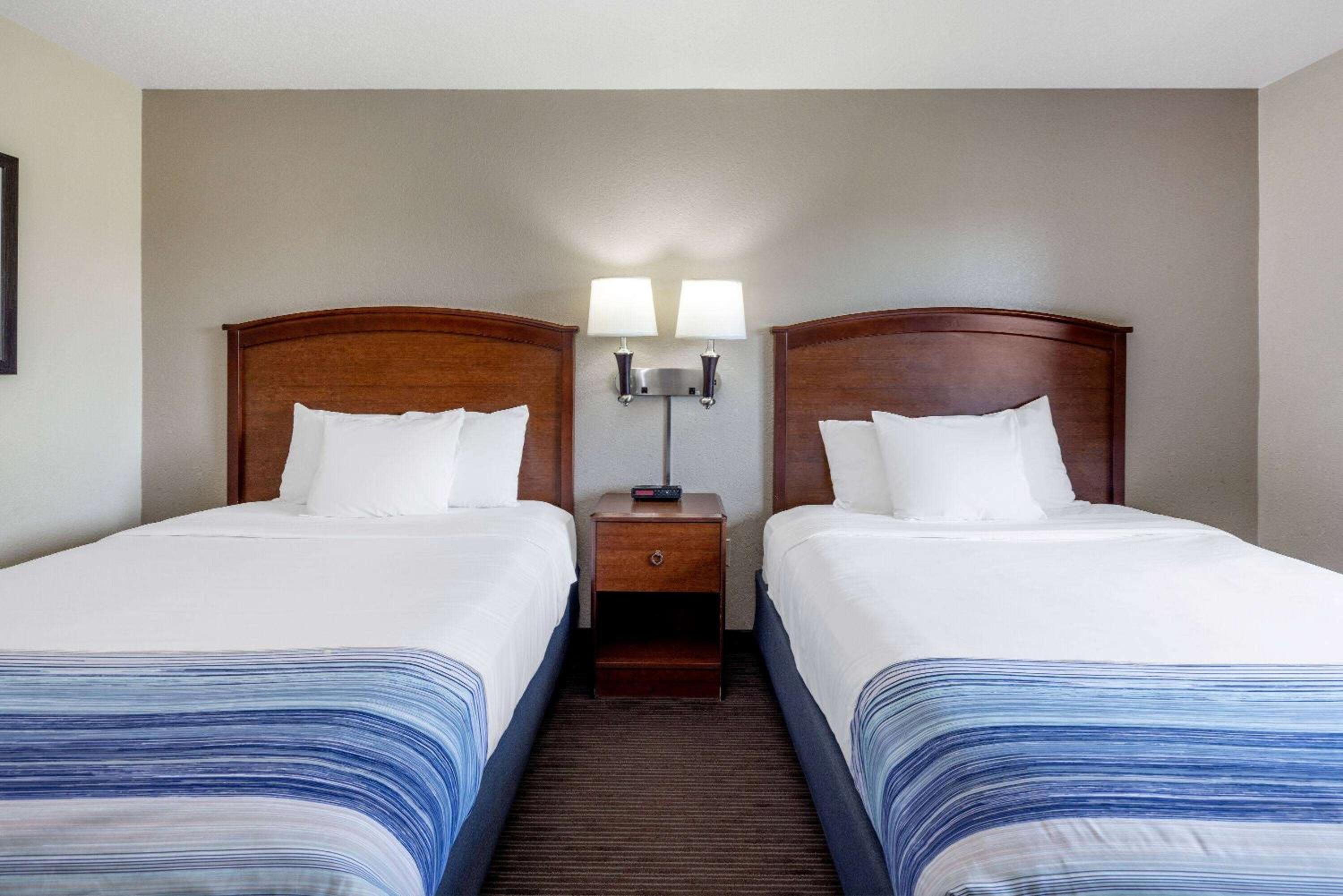 Queen Room with Two Queen Beds - Pet Friendly/Non-Smoking - Photo 1