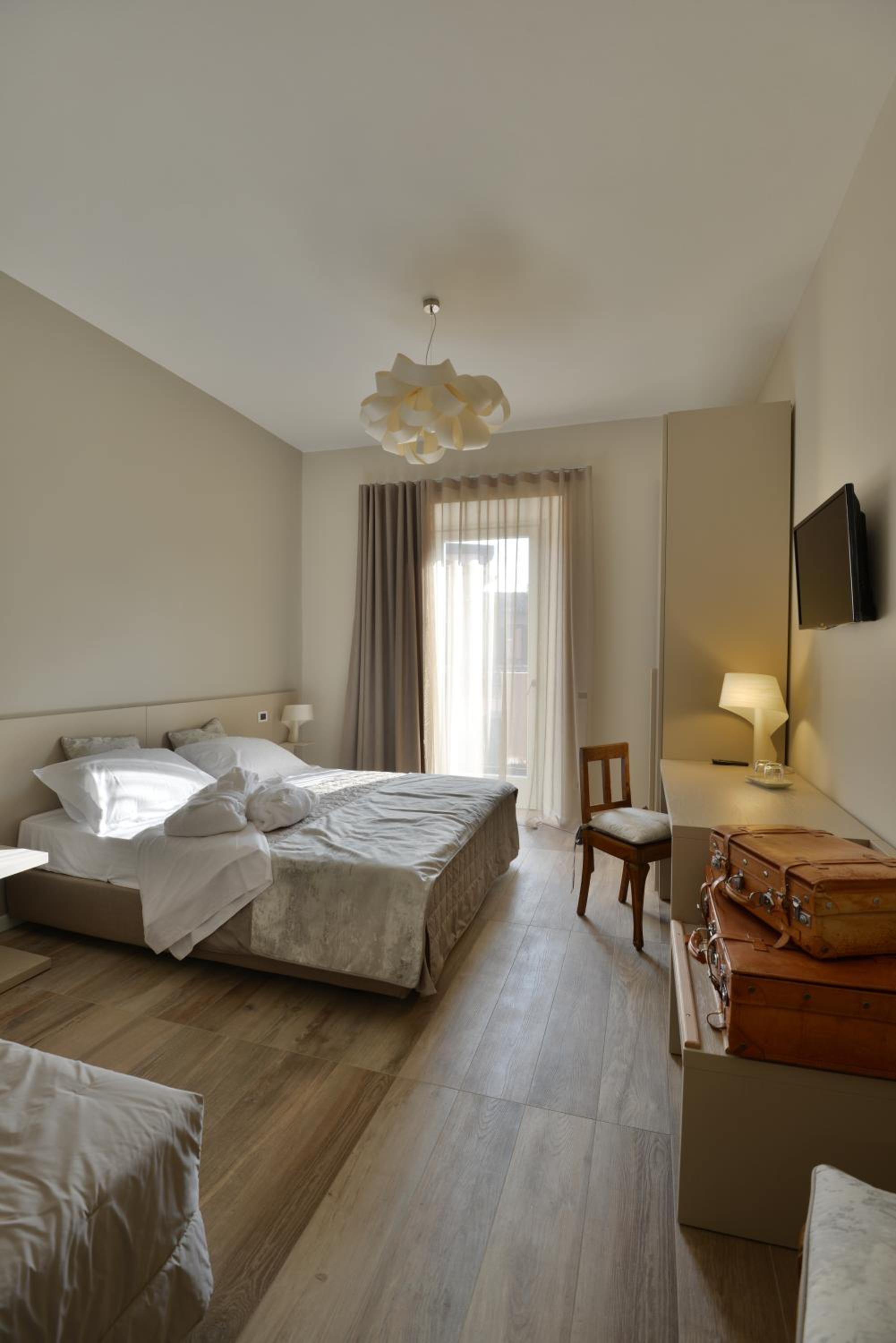 Triple Room with Balcony - Photo 9