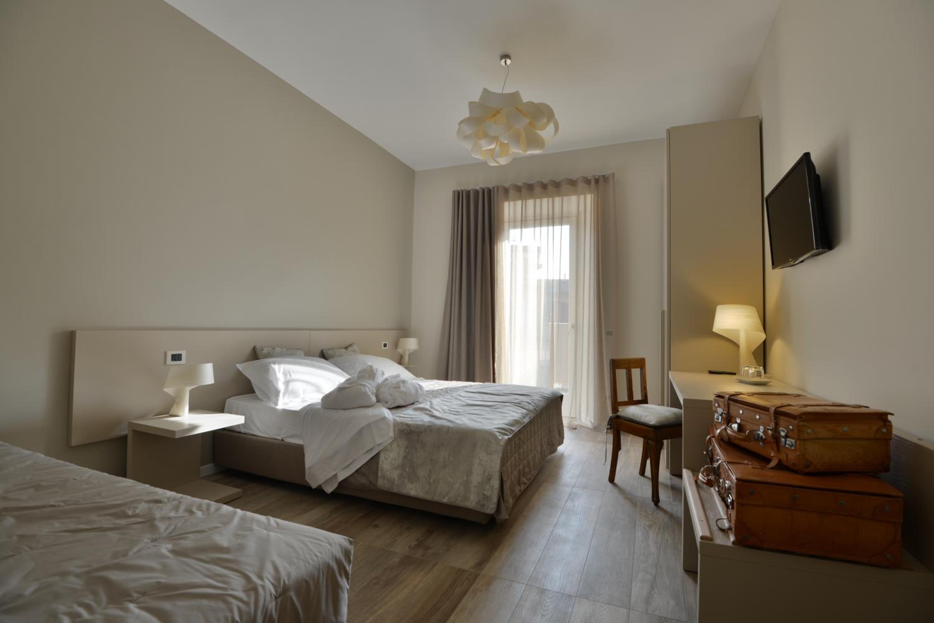 Triple Room with Balcony - Photo 1