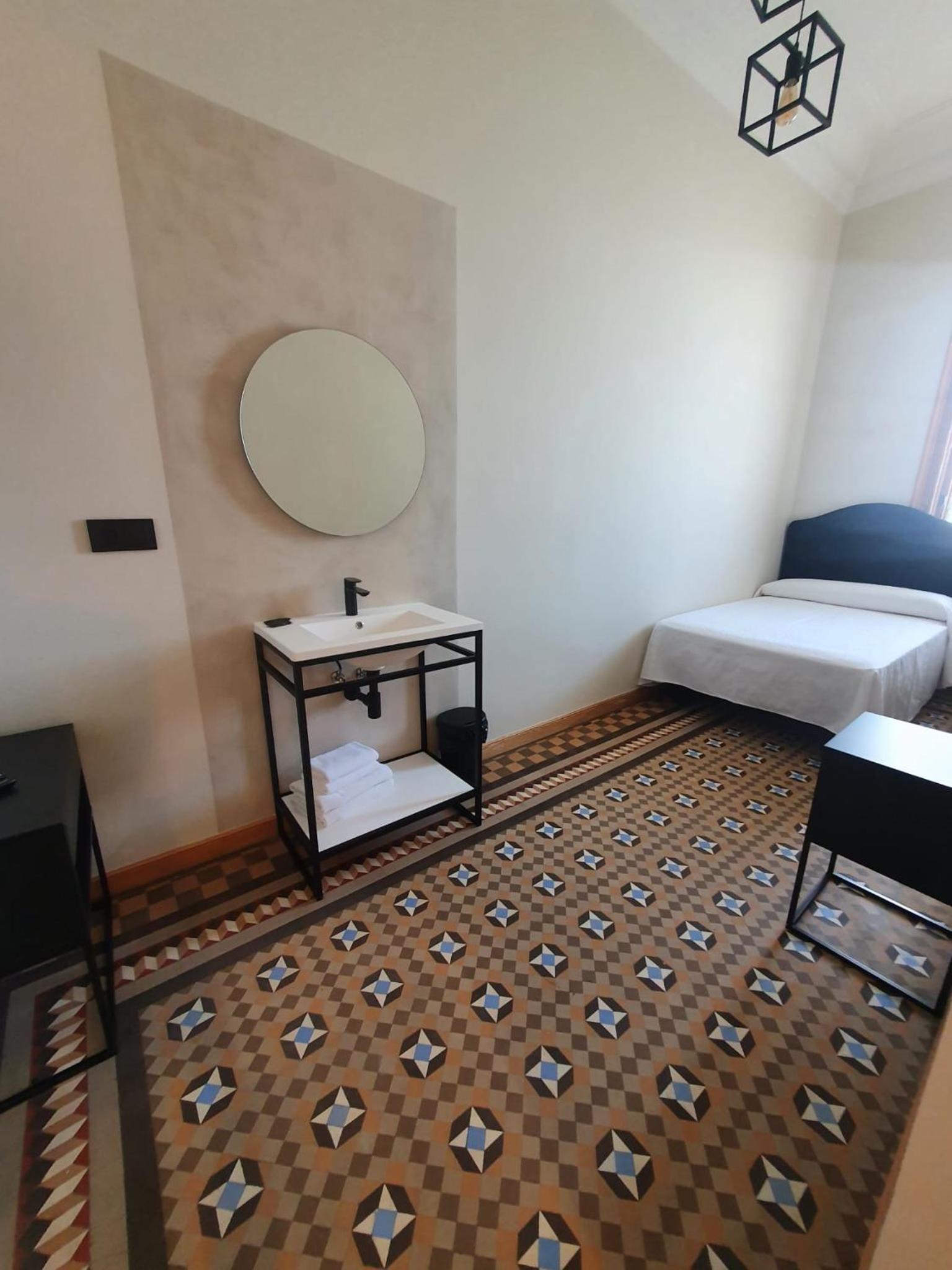 Habitación doble con baño compartido