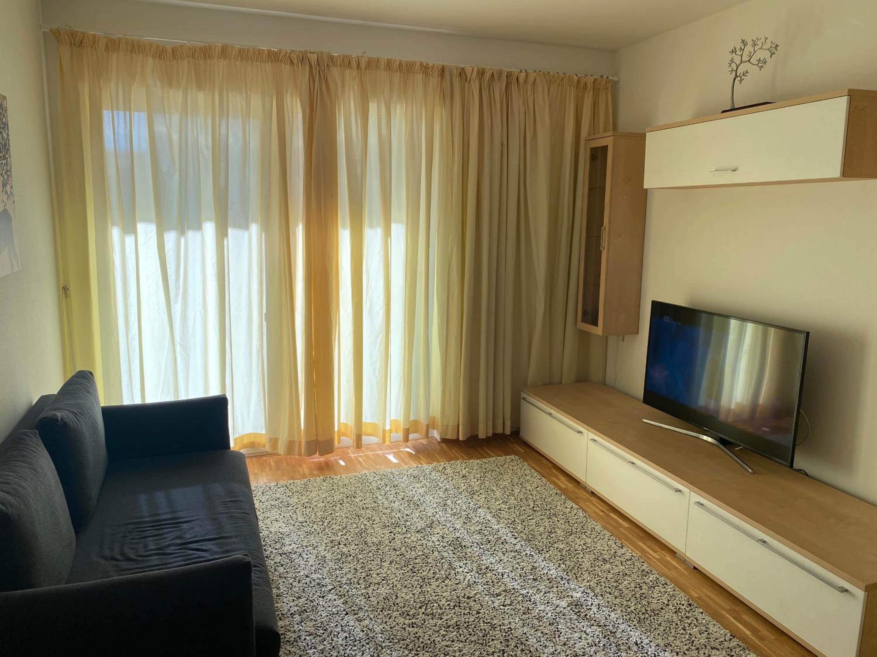 Three-Bedroom Apartment photo 1