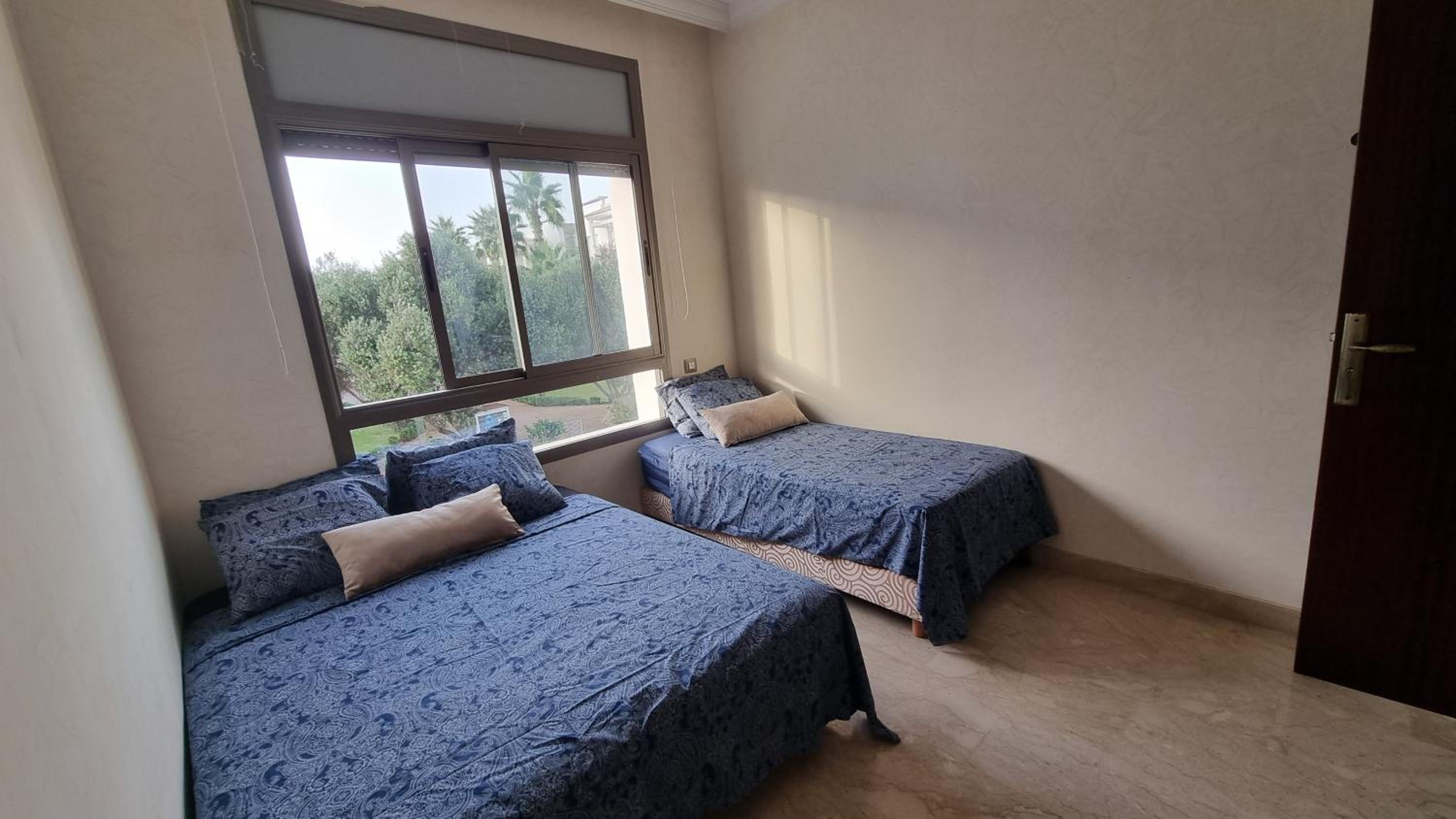 Three-Bedroom Apartment photo 1
