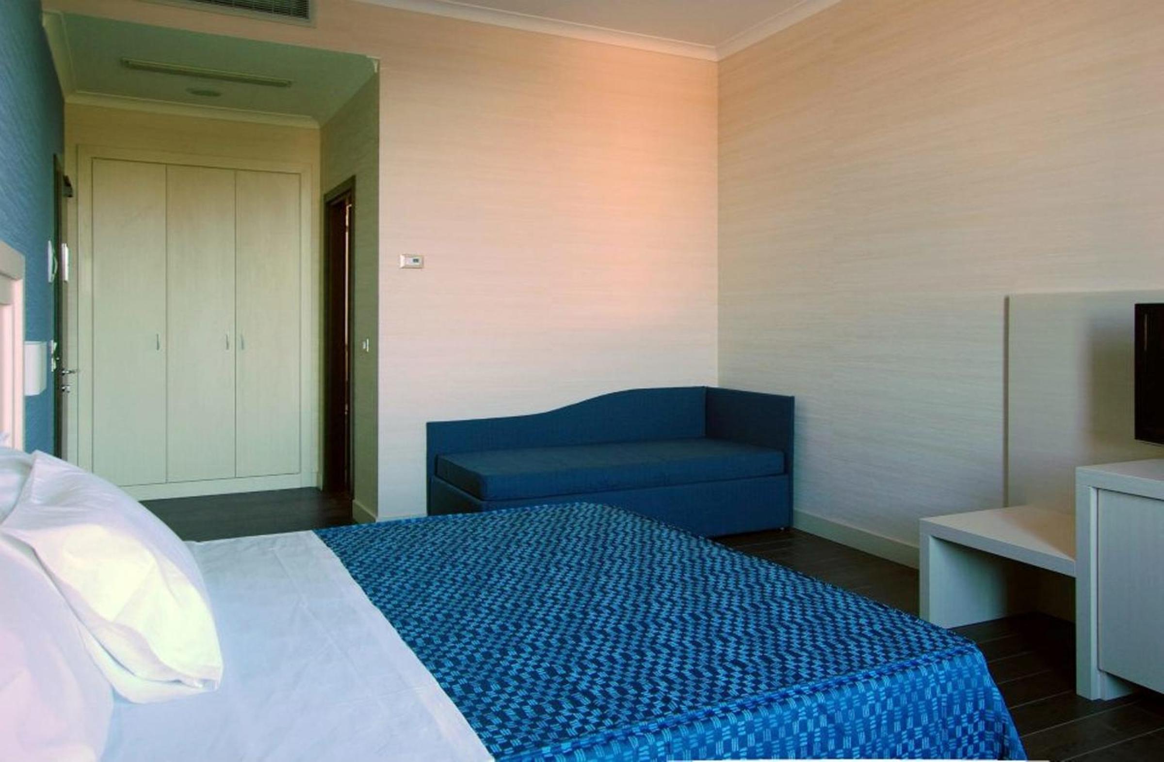 Deluxe Triple Room - Photo 1