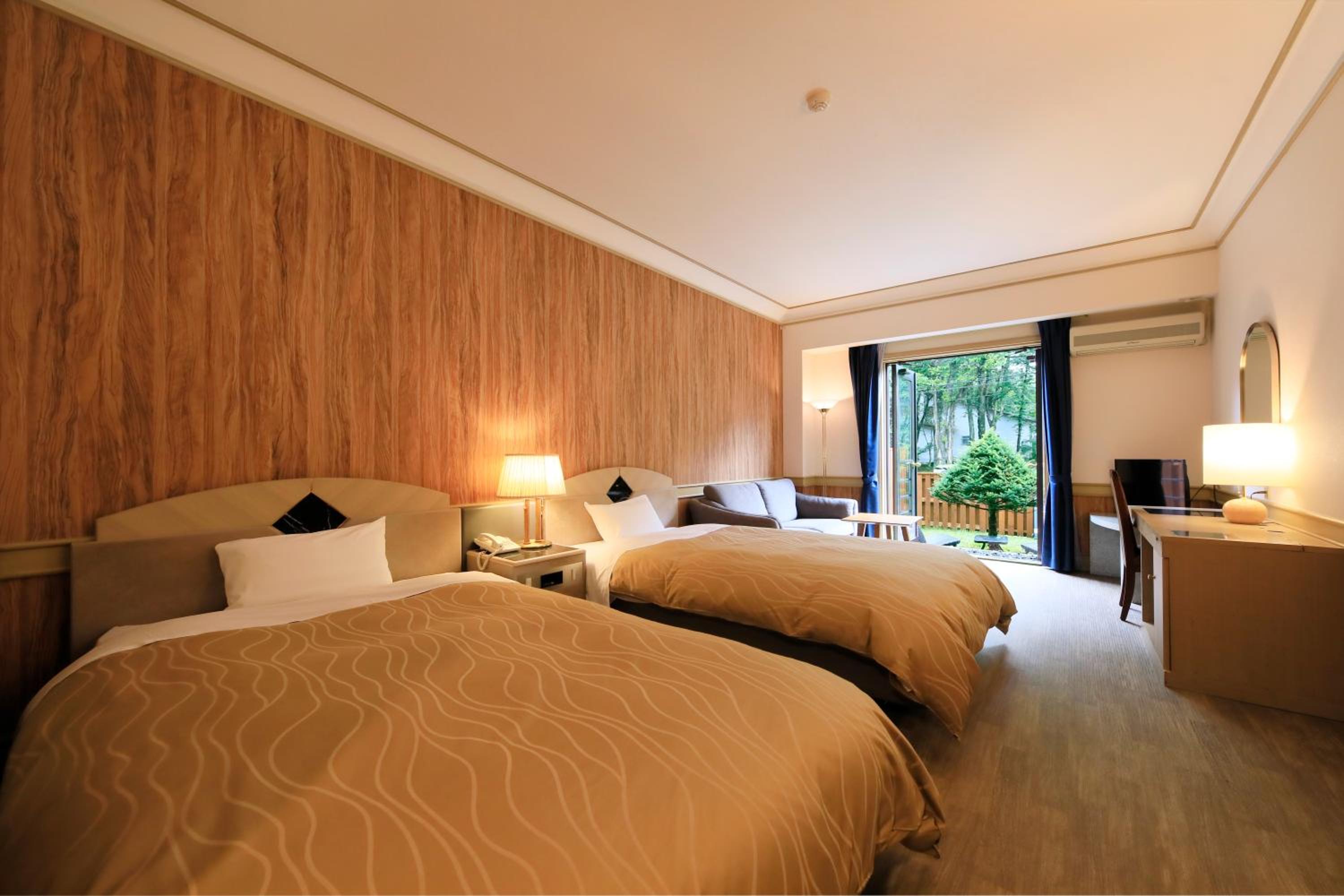 Twin Room with Garden View - Photo 1