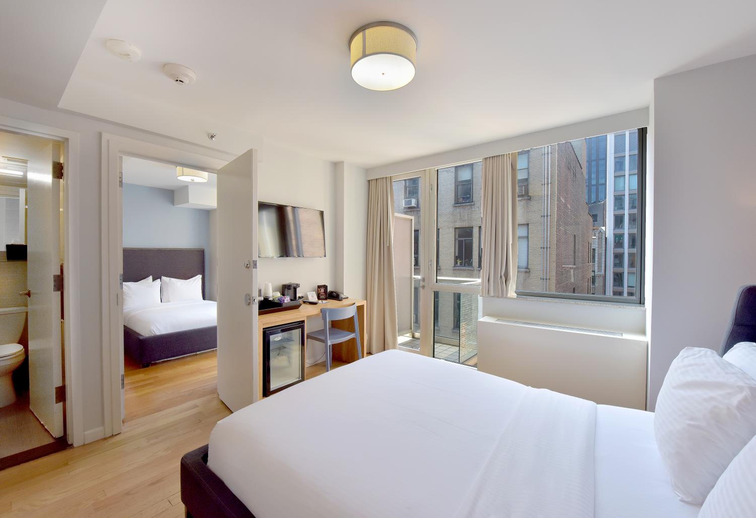 Premium Suite with Two Double Beds with Balcony