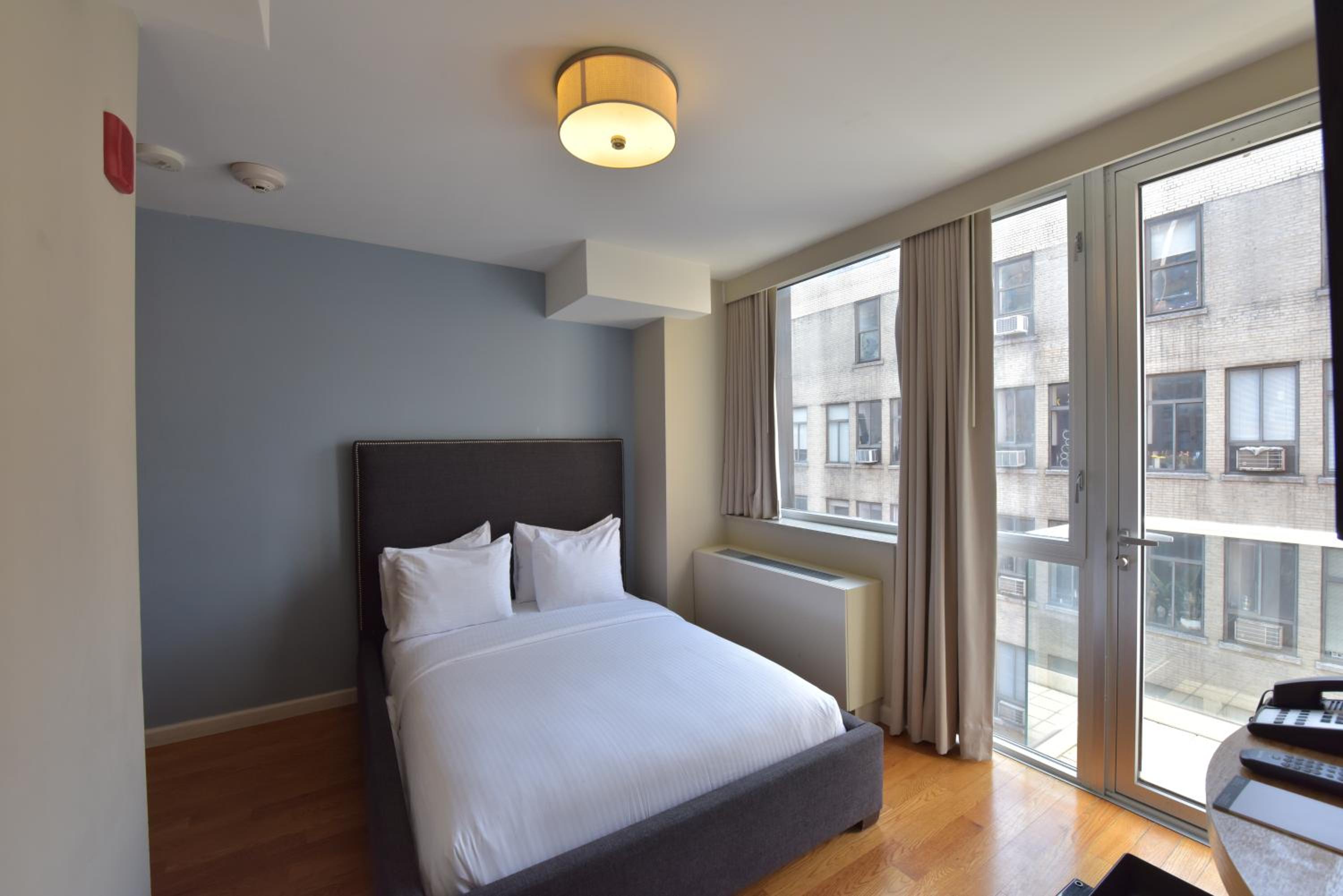 Premium Suite with Two Double Beds with Balcony