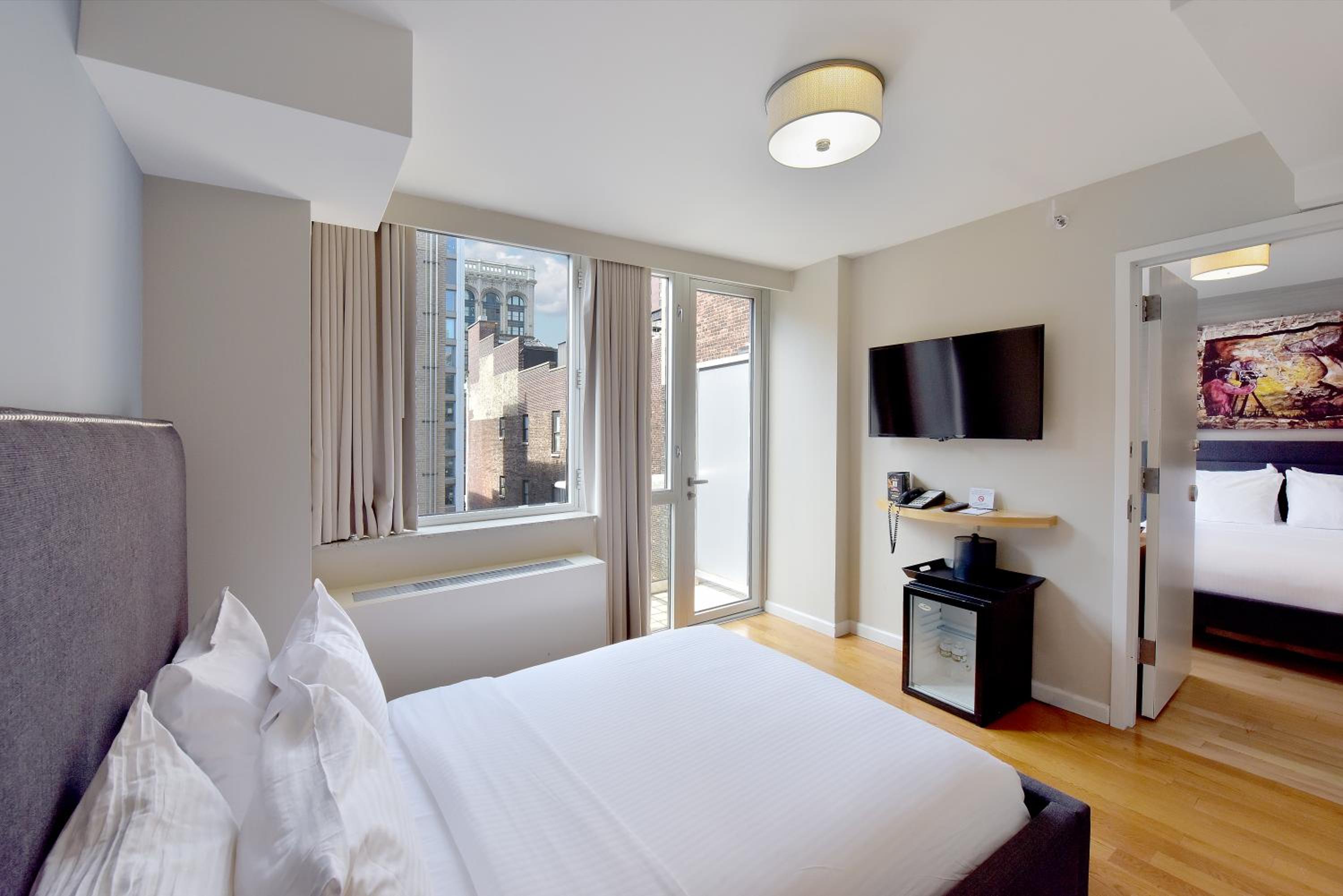 Premium Suite with Two Double Beds with Balcony