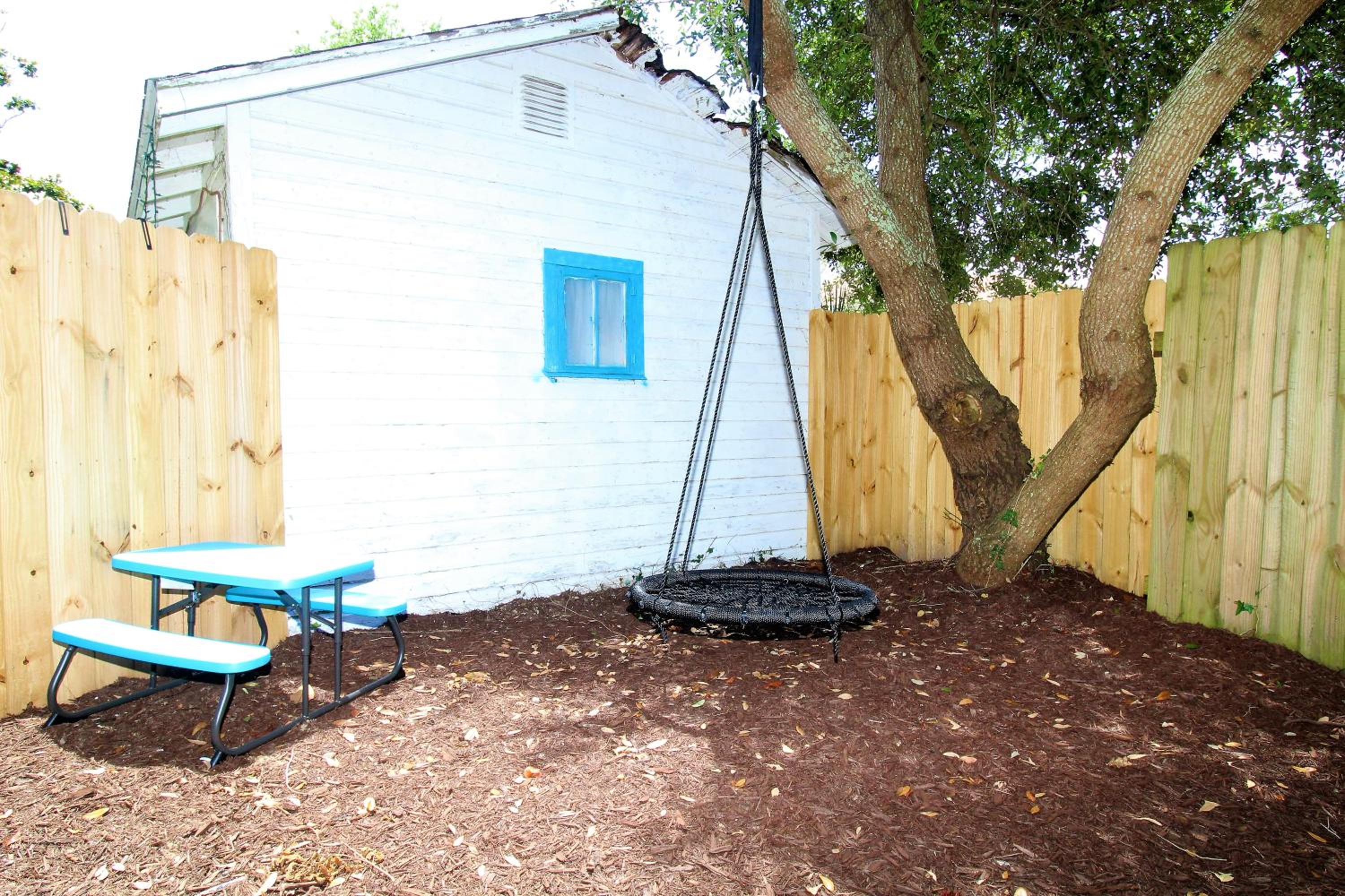 Three-Bedroom House - Photo 24
