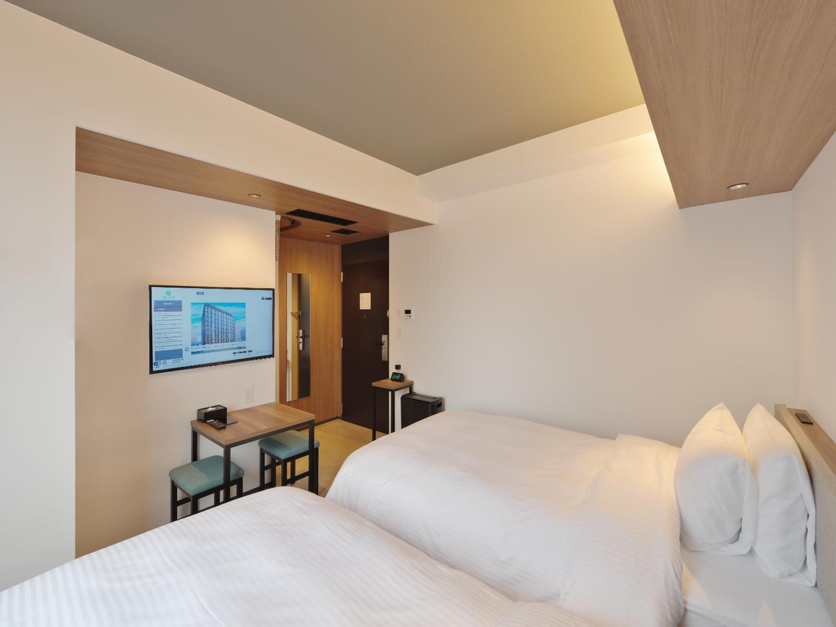 Standard Twin Room with Complimentary Breakfast - Non-Smoking - Photo 7
