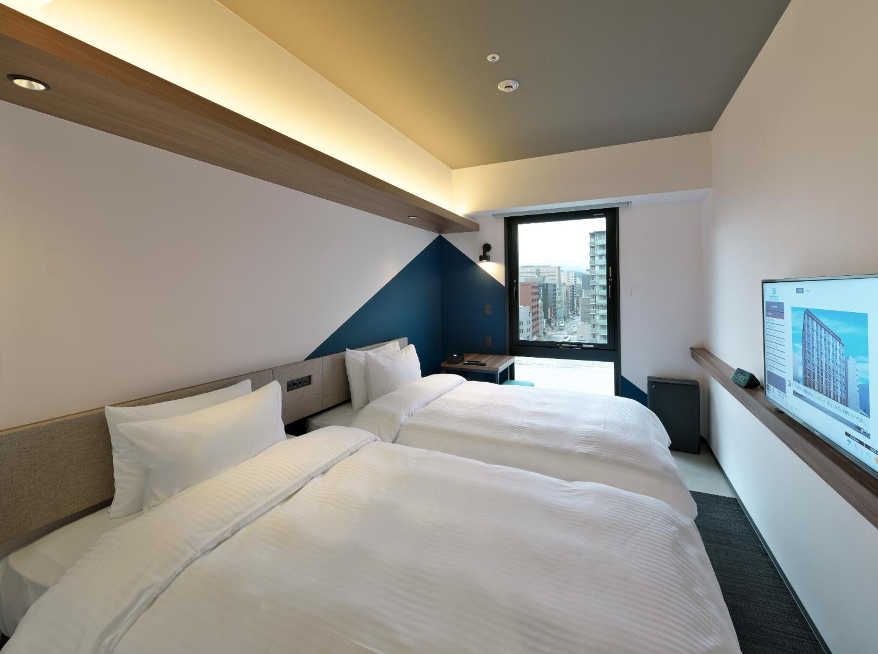 Standard Twin Room with Complimentary Breakfast - Non-Smoking - Photo 11