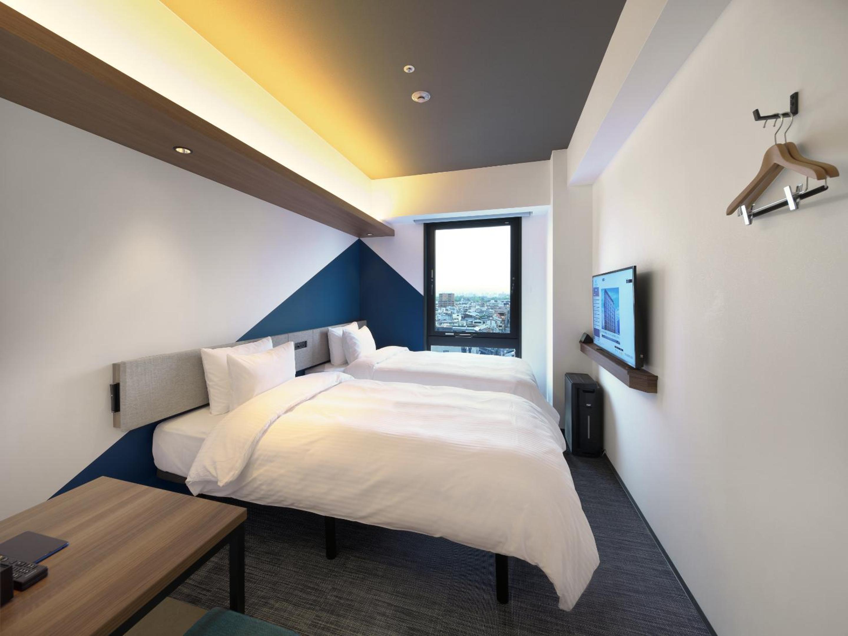 Standard Twin Room with Complimentary Breakfast - Non-Smoking - Photo 13