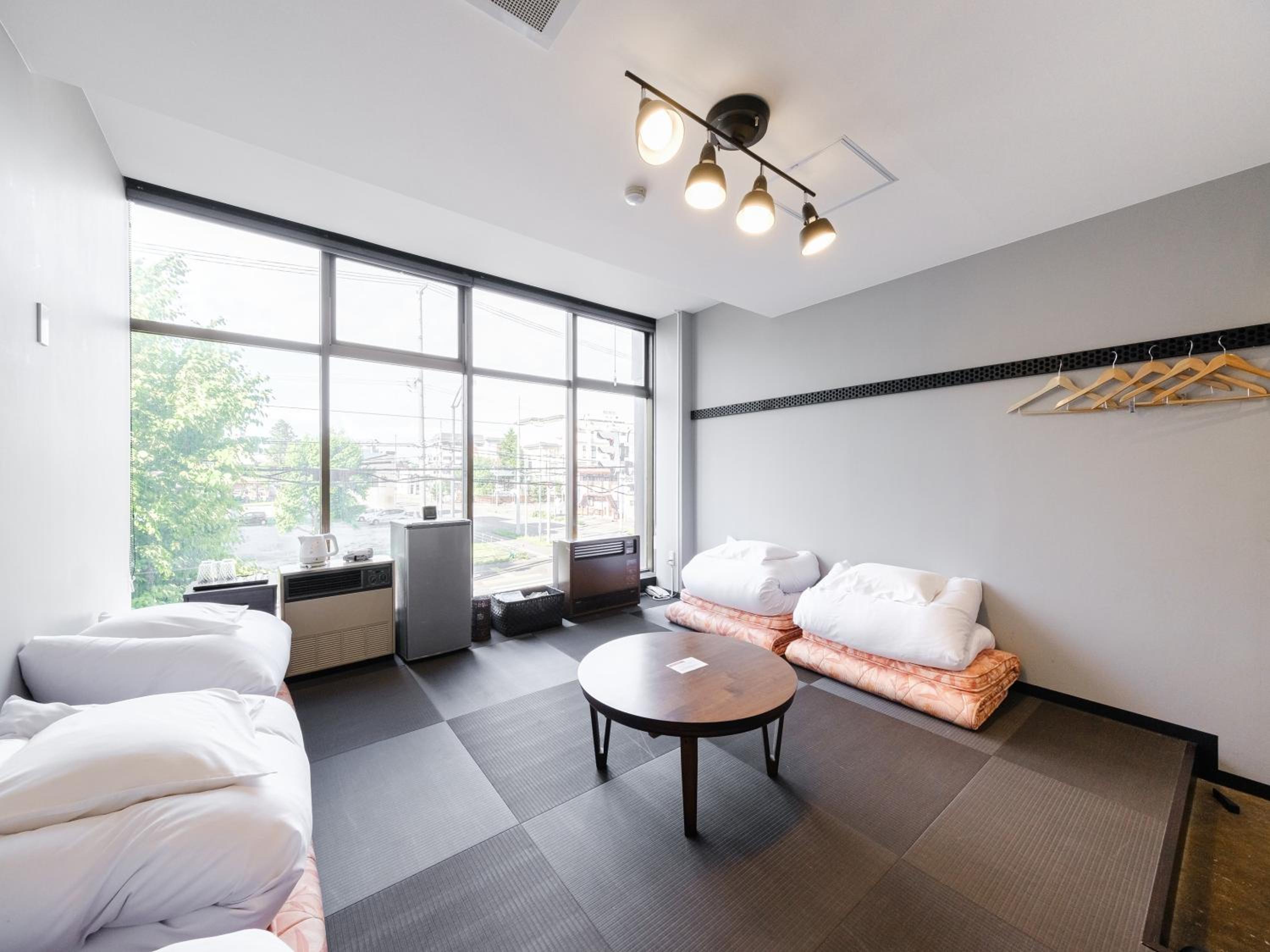 Japanese-Style Quadruple Room with Shared Bathroom - Non-Smoking photo 3