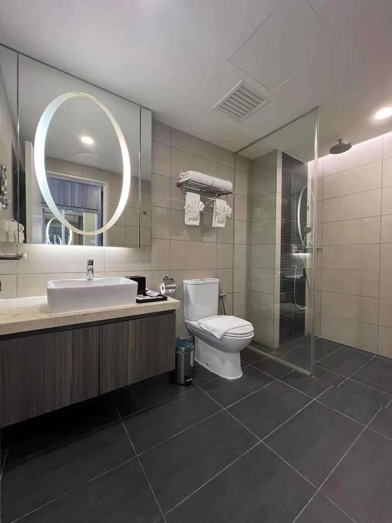 Three-Bedroom Apartment - Photo 18