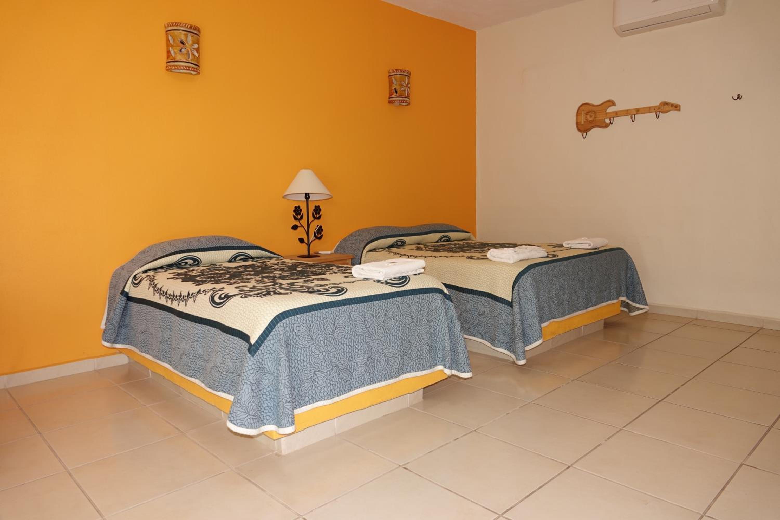 Deluxe Triple Room - Photo 1