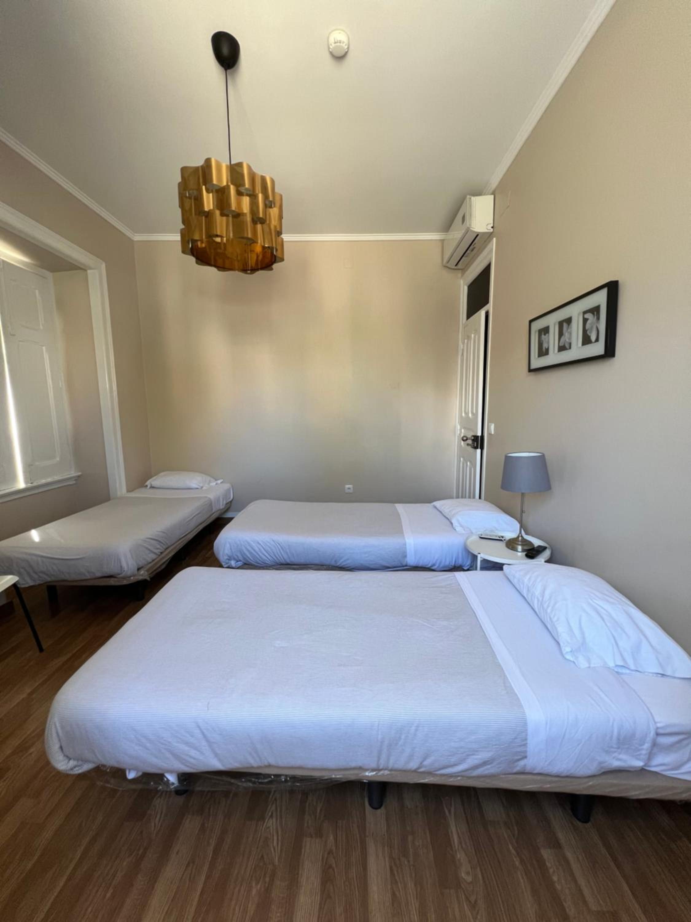 Triple Room with Private Bathroom photo 3