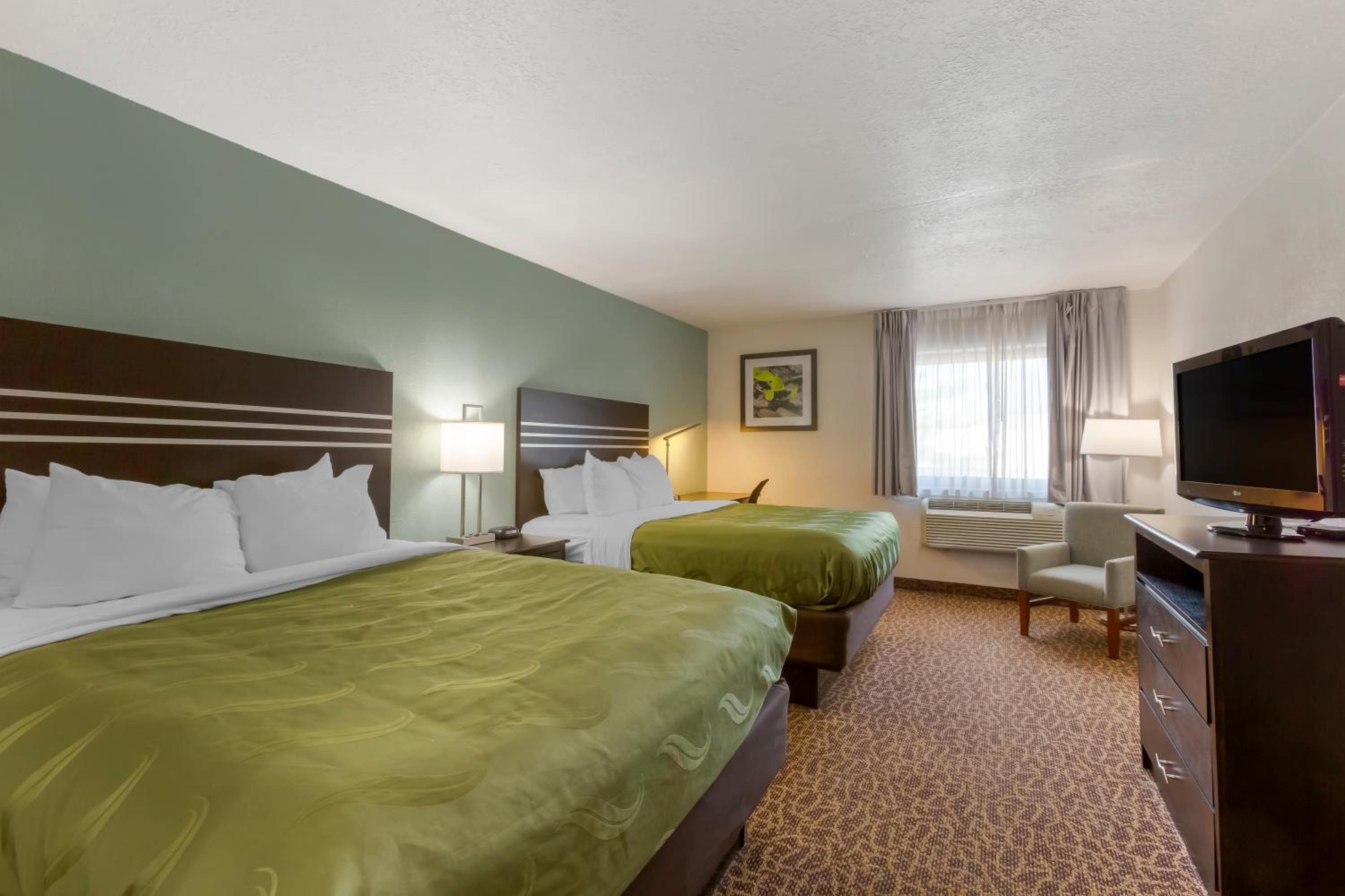 Queen Room with Two Queen Beds - Smoking photo 2