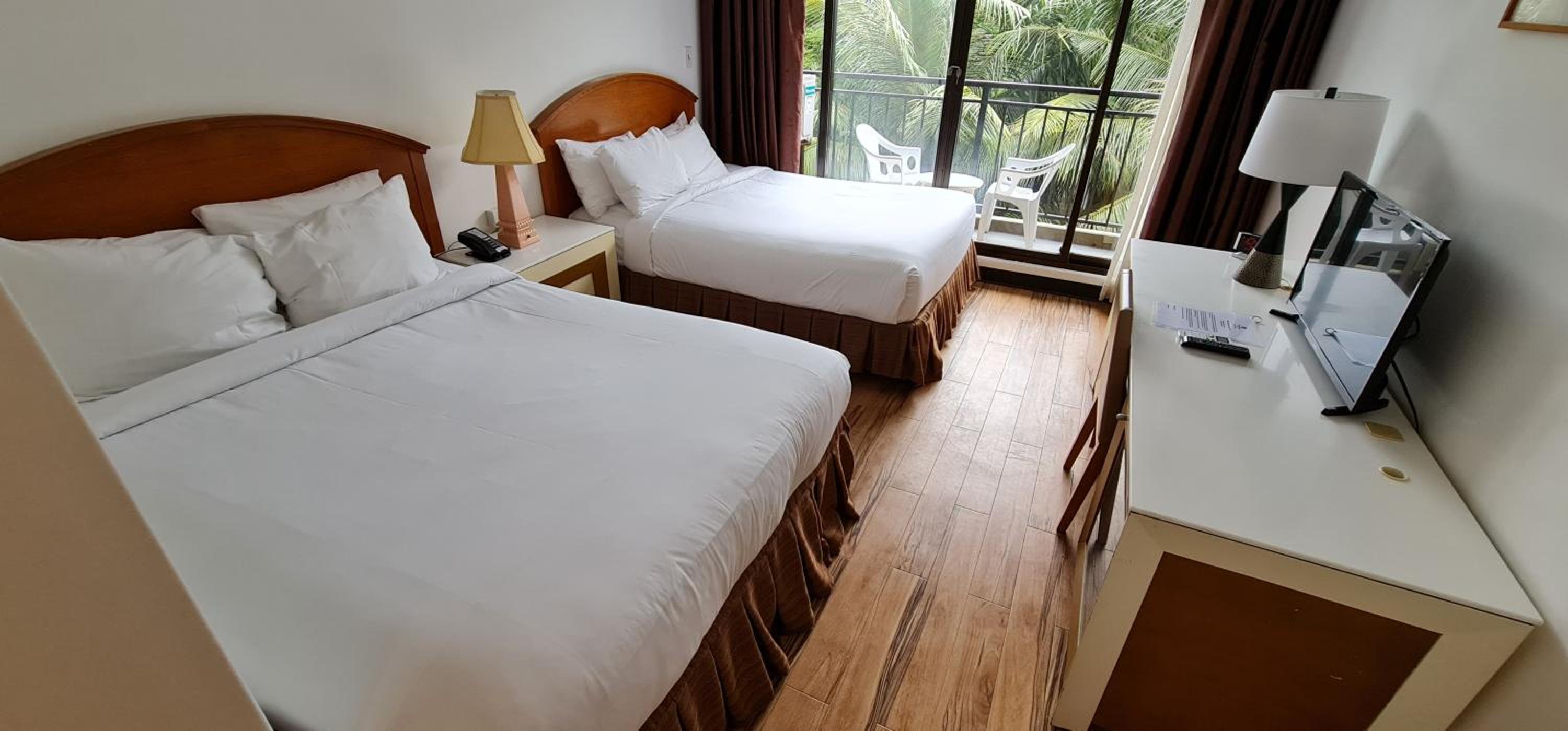 Deluxe Queen Room with Two Queen Beds - Non-Smoking - Photo 1