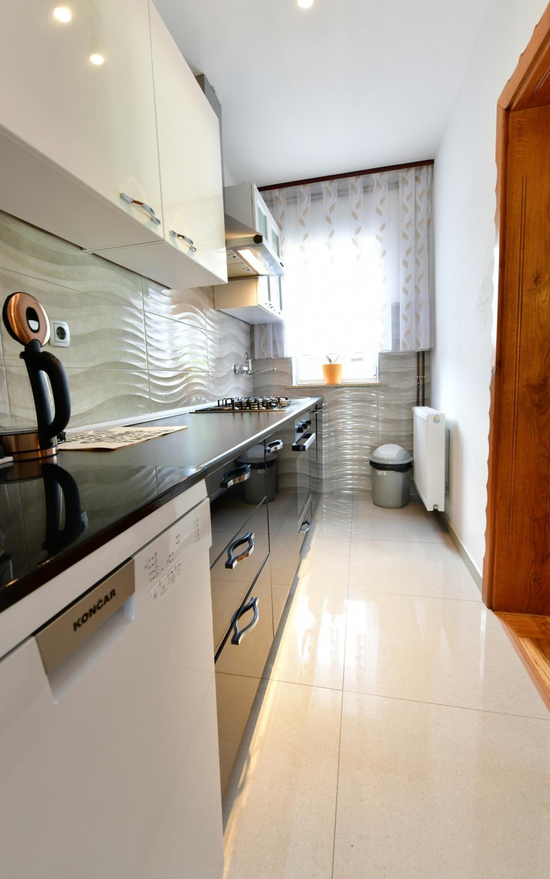Three-Bedroom Apartment - Photo 38